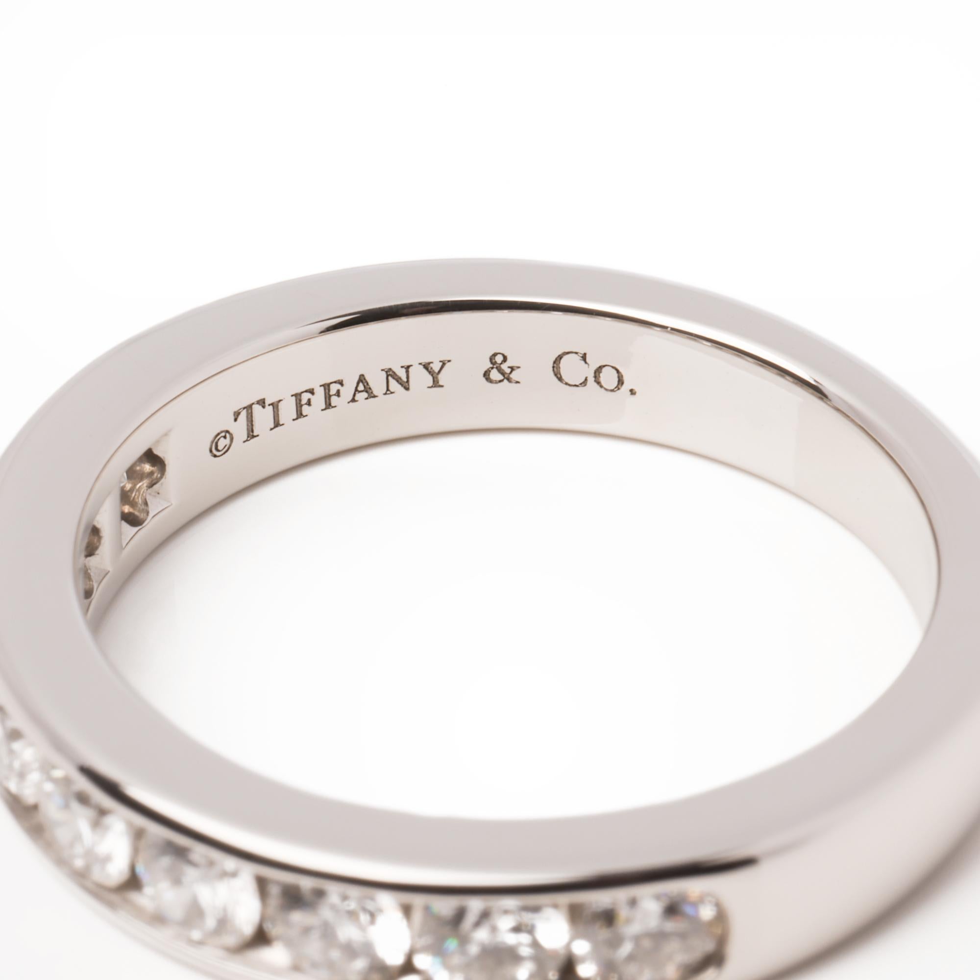 This ring by Tiffany & Co. features 9 round brilliant cut diamonds totalling an estimated 0.81ct, set in platinum. UK ring size M. EU ring size 53. US ring size 61/2.