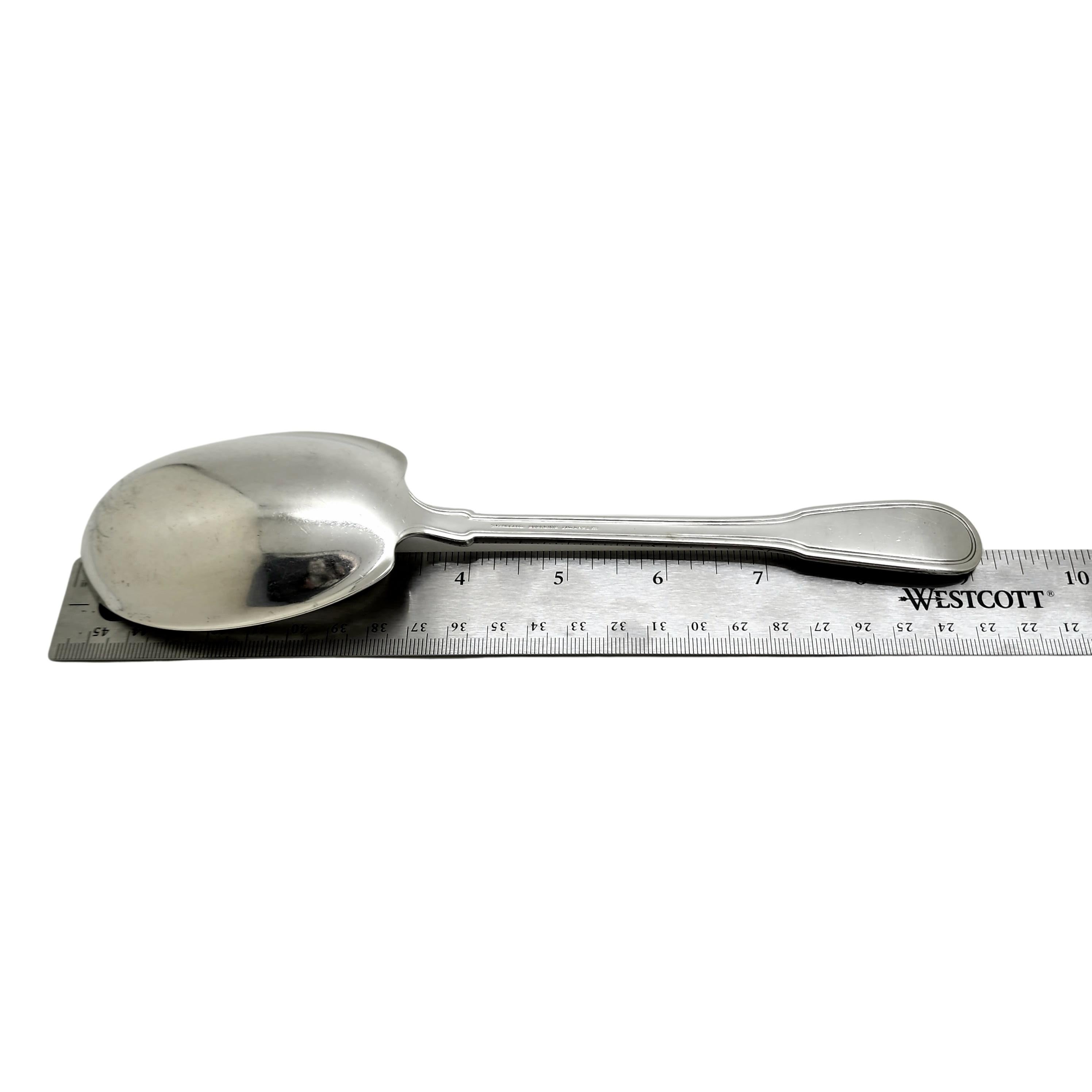 Sterling silver large solid berry/casserole spoon in the Hamilton pattern by Tiffany & Co with monogram.

Monogram appears to be C M over W J

This large spoon features a simple and classic rounded handle design. Does not include Tiffany & Co box or