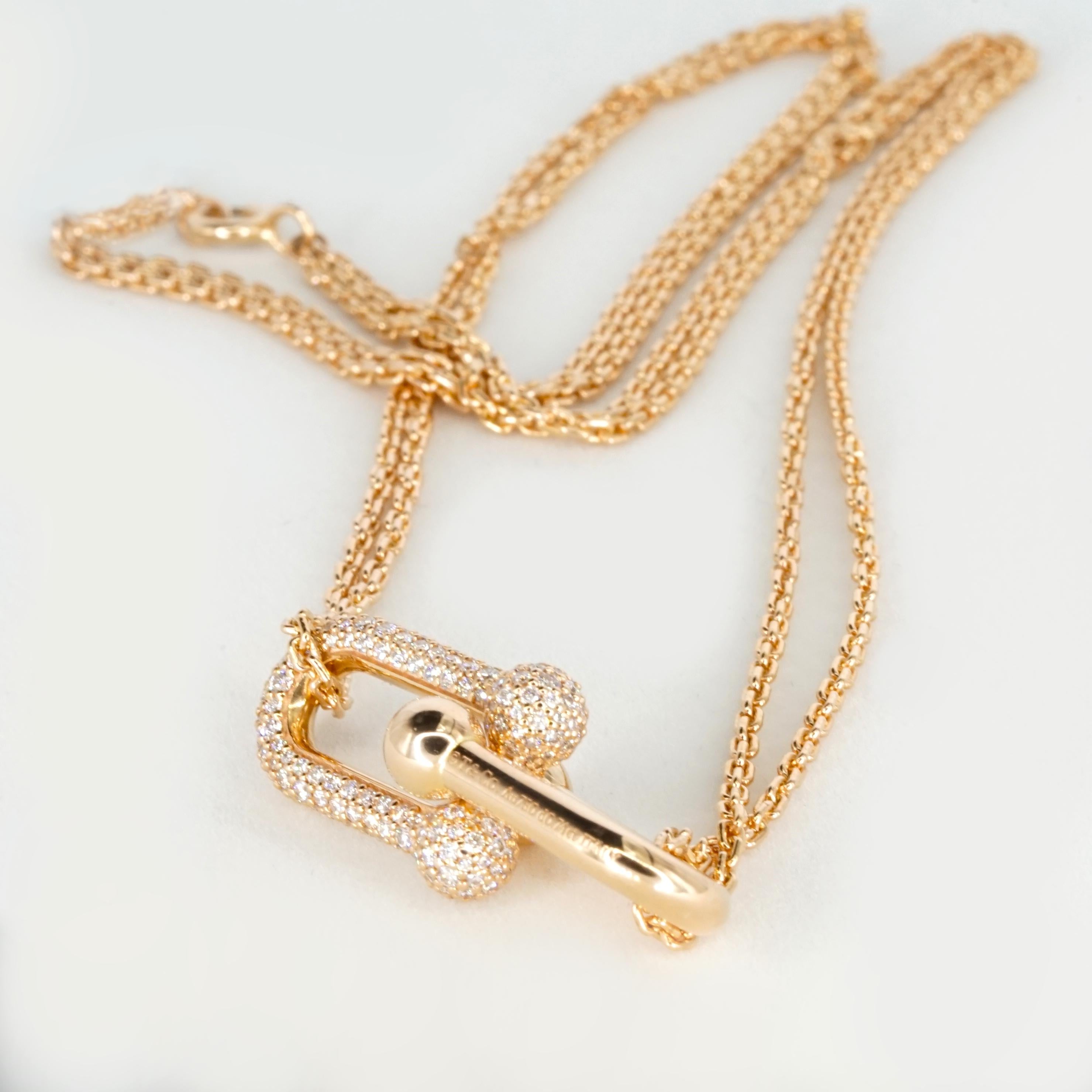 Contemporaneo Tiffany & Co. Collana con ciondolo con diamante a doppio anello in oro rosa 18 carati di Hardware. in vendita