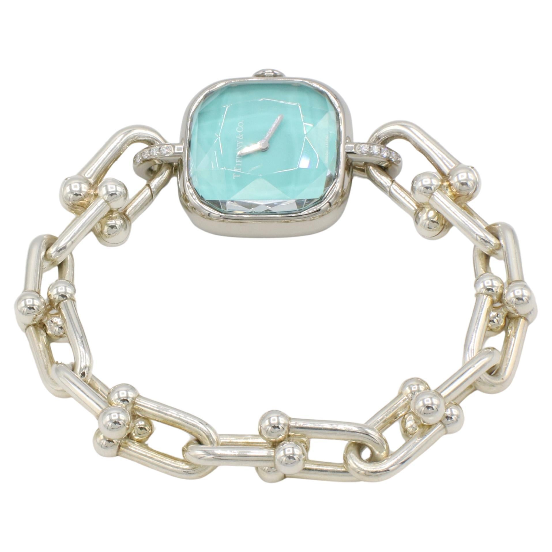 Tiffany & Co. HardWare Link Plata de Ley y Acero Diamante Natural Azul Reloj Pulsera
Metal: Plata de ley y acero inoxidable
Esfera: Azul
Movimiento: Movimiento de cuarzo suizo de alta precisión
Diamantes: 0.07 CTW D-F VVS diamantes naturales
