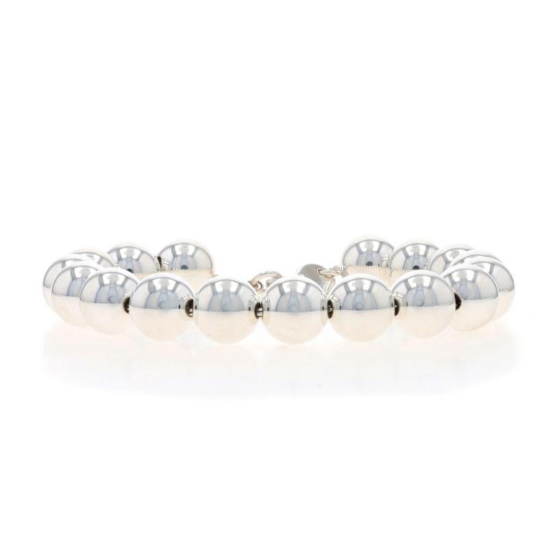 Retail Price: $500

Brand: Tiffany & Co.
Collection: HardWear
Design:  10mm Ball

Metal Content: Sterling Silver

Style: Beaded
Chain Style: Prince of Wales
Fastening Type: Lobster Claw Clasp

Measurements

Length: 7 1/2