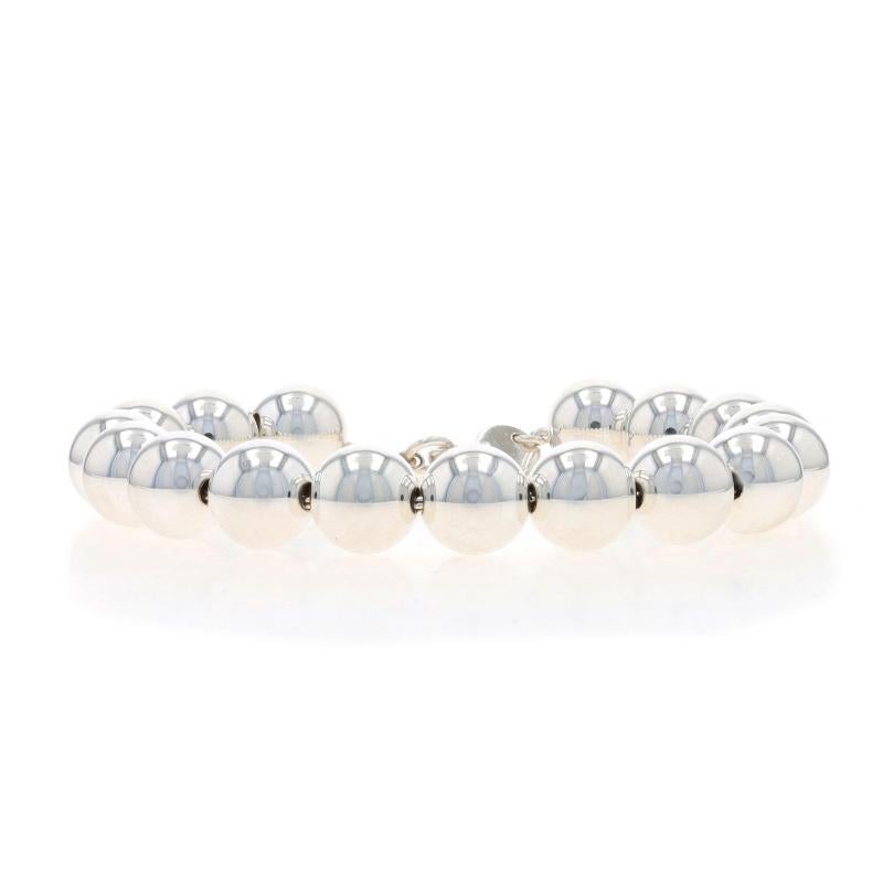 Retail Price: $500

Brand: Tiffany & Co.
Collection: HardWear
Design:  10mm Ball

Metal Content: Sterling Silver

Style: Beaded
Chain Style: Prince of Wales
Fastening Type: Lobster Claw Clasp

Measurements

Length: 7 1/4