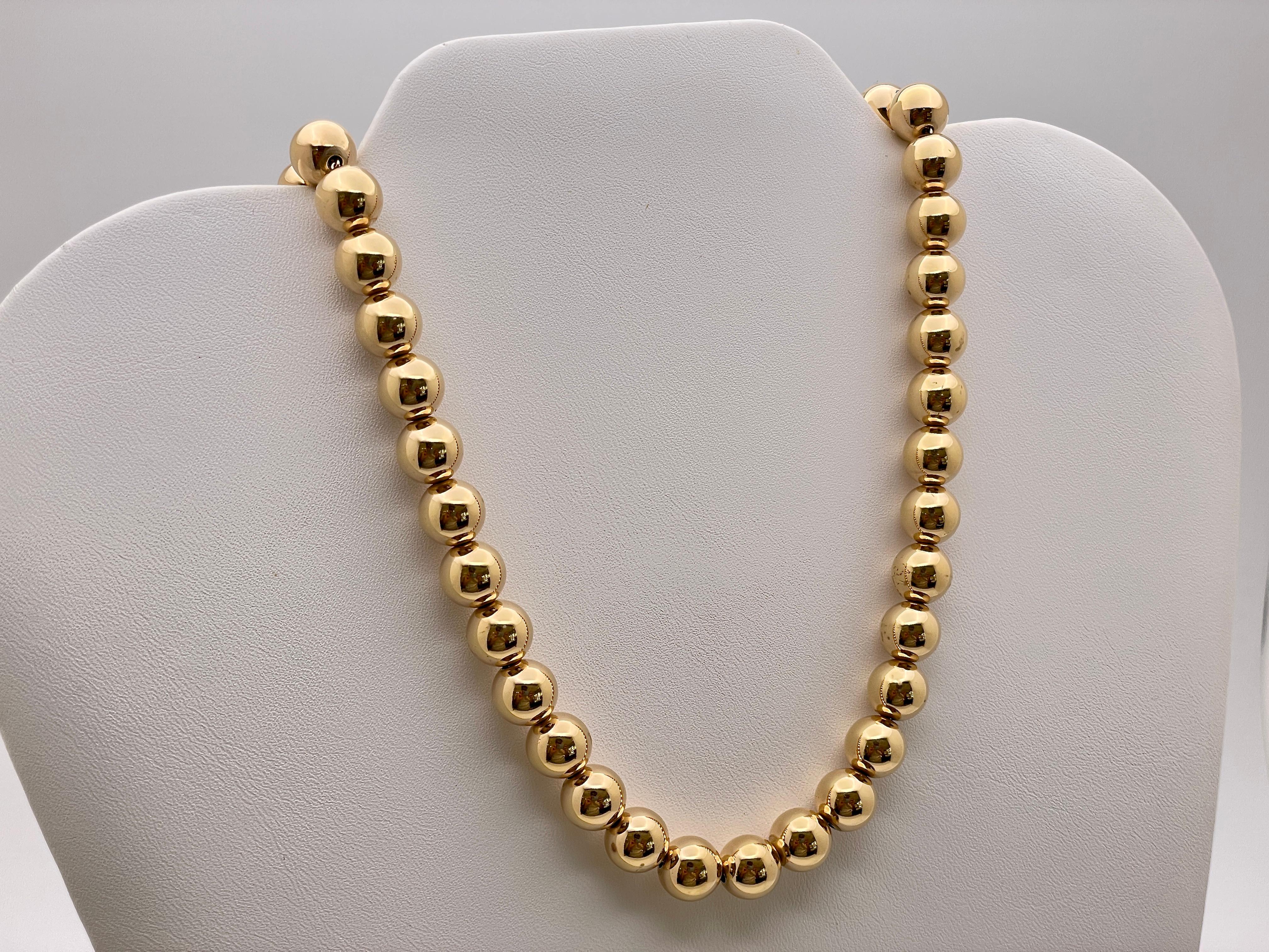 An original 14K yellow gold Tiffany and Co. HardWear ball necklace. Featuring golden balls from end to end, each measuring 10 mm in diameter. 

Gross Weight: 46.70 Grams
Length: 18.25 Inches