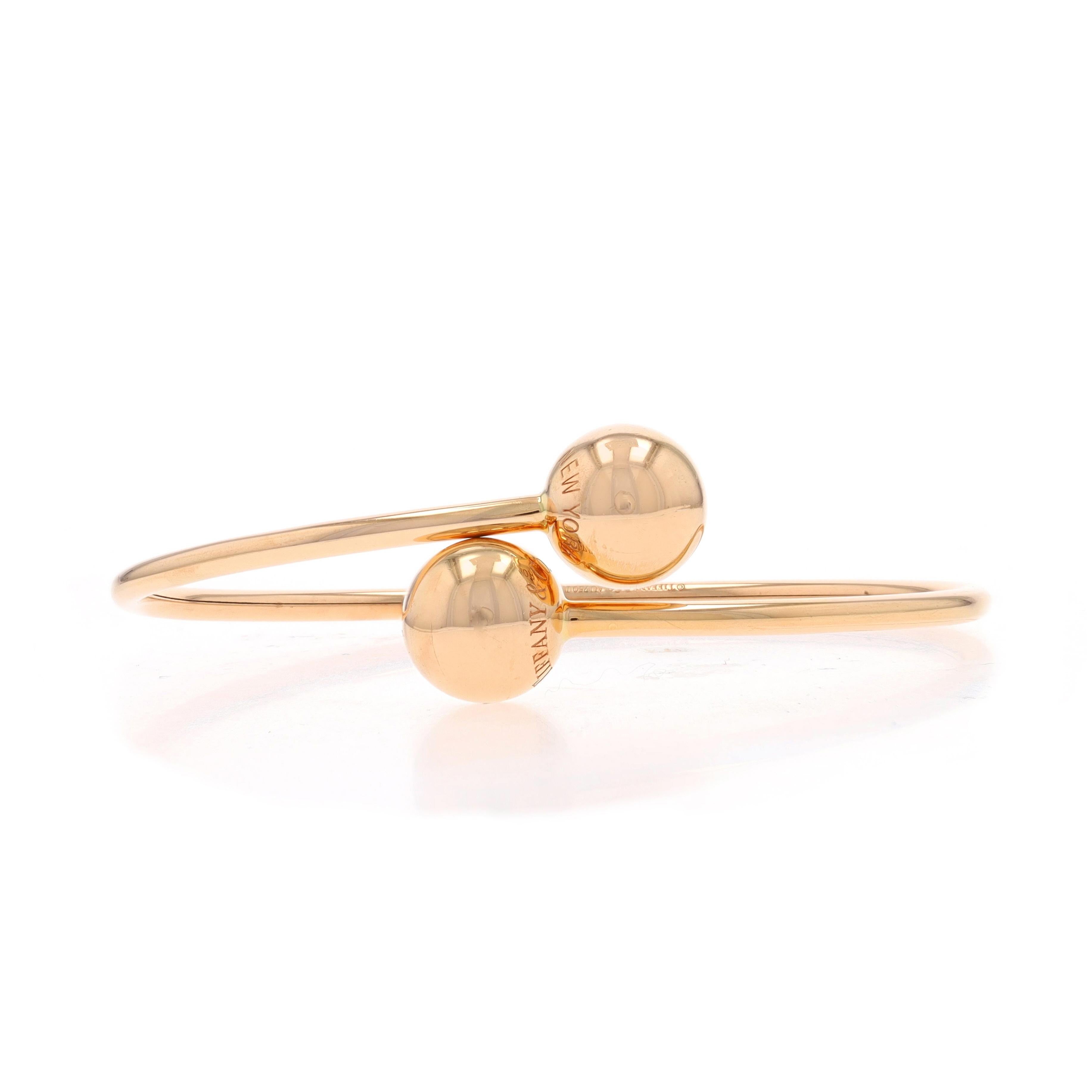 Brand: Tiffany & Co.
Collection: Hardwear
Design:  Bypass Ball Bangle

Metal Content: 18k Rose Gold

Style: Bypass Bangle
Fastening Type: N/A (slides over wrist)

Measurements

Inner Circumference: 6 1/4