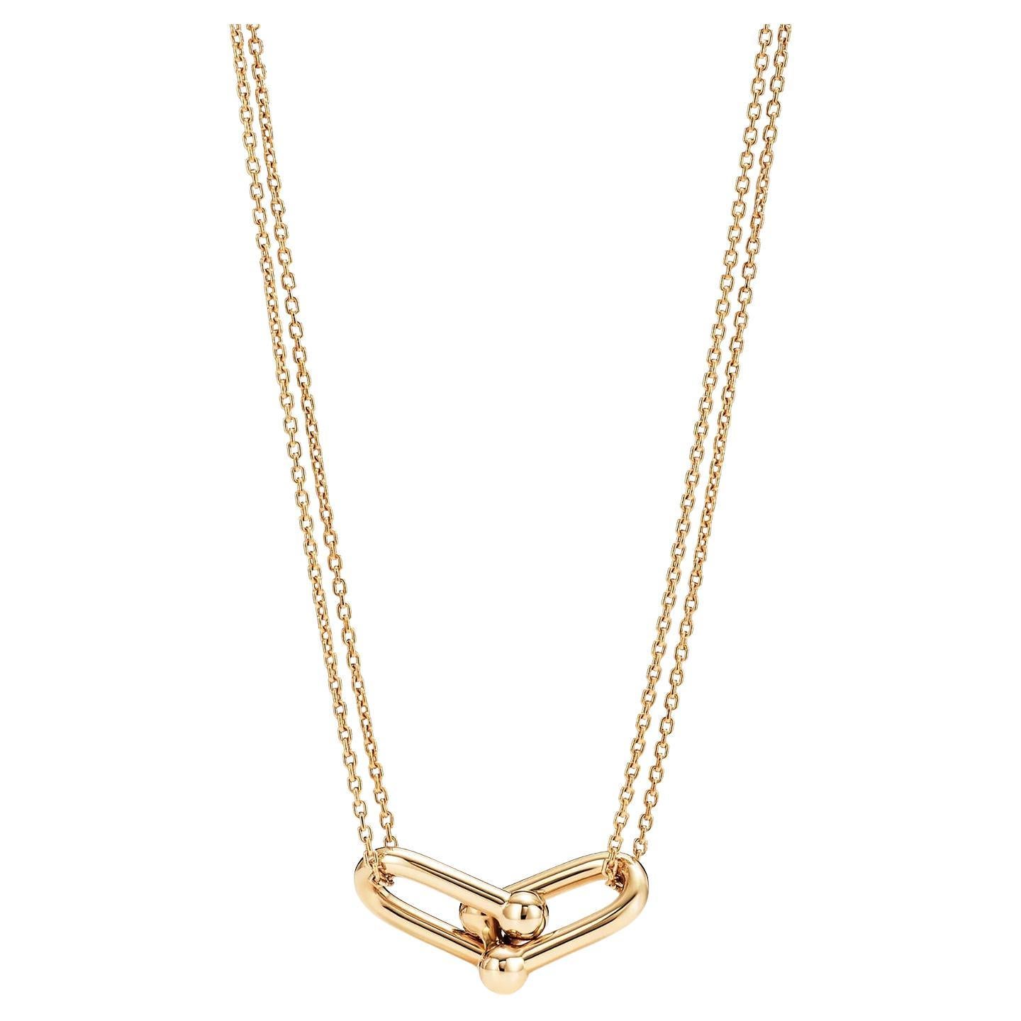 A. Link 
Co. Ciondolo grande a doppio anello in oro giallo 18 carati in vendita