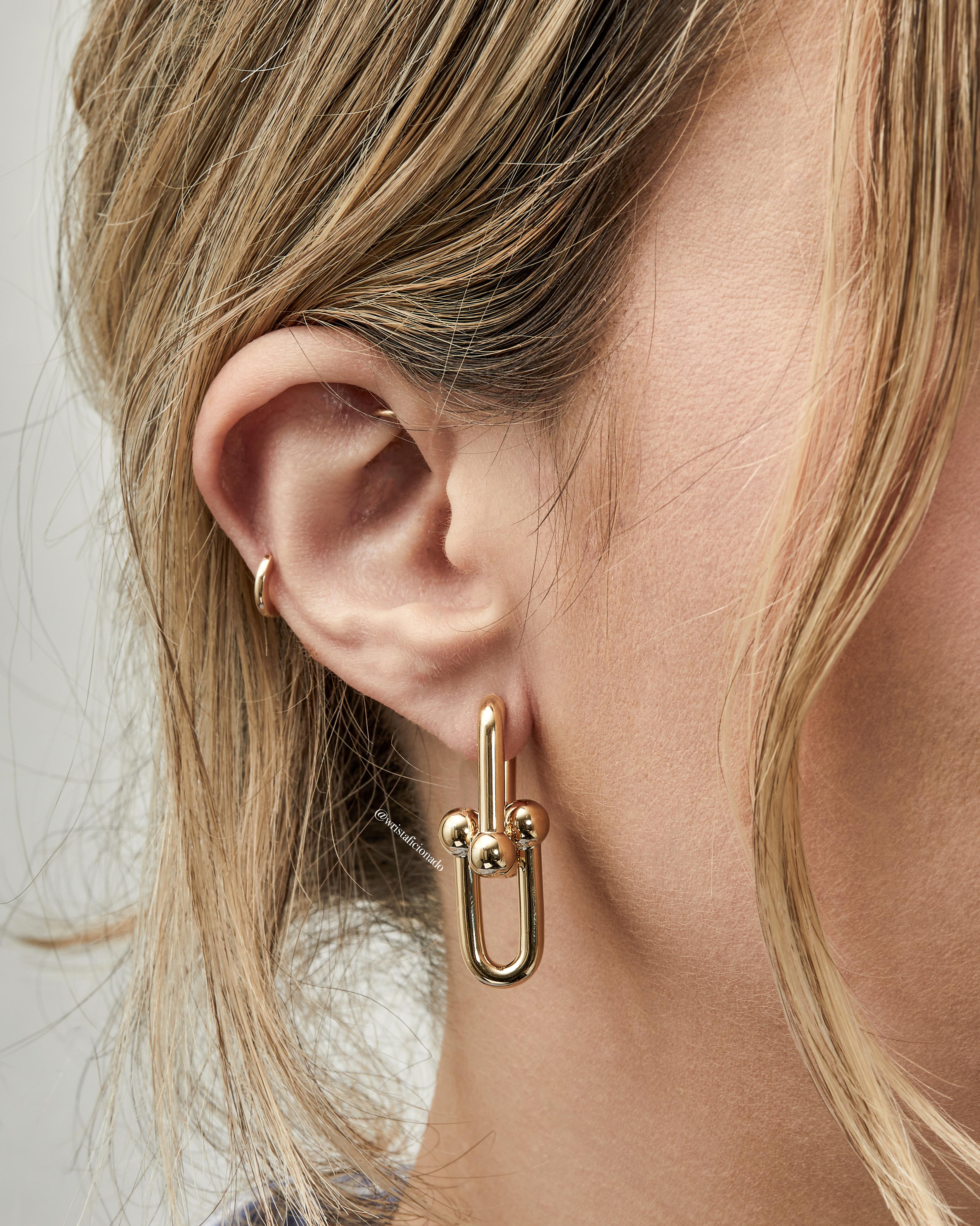 These large gold Tiffany & Co's HardWear link earrings capture the urban-edge of New York City. Perfect choice for elegant women, who are not afraid to experiment, this pair is a valuable addition to once selection of jewelry pieces. Crafted in