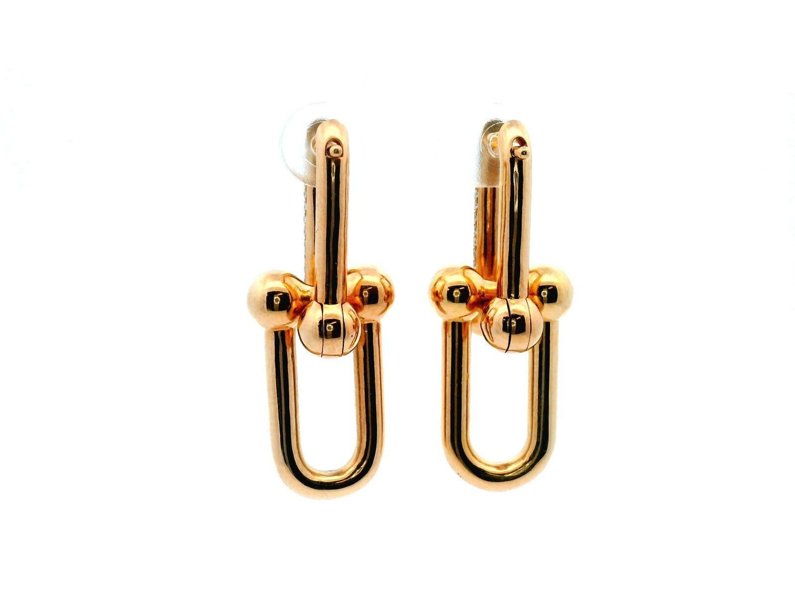 Tiffany & Co's Hardware earrings are like a burst of New York City's lively vibe. They're big, bold, and made of fancy 18k rose gold, jazzed up with lots of tiny diamonds. These earrings don't shy away—they make a statement with their larger-sized