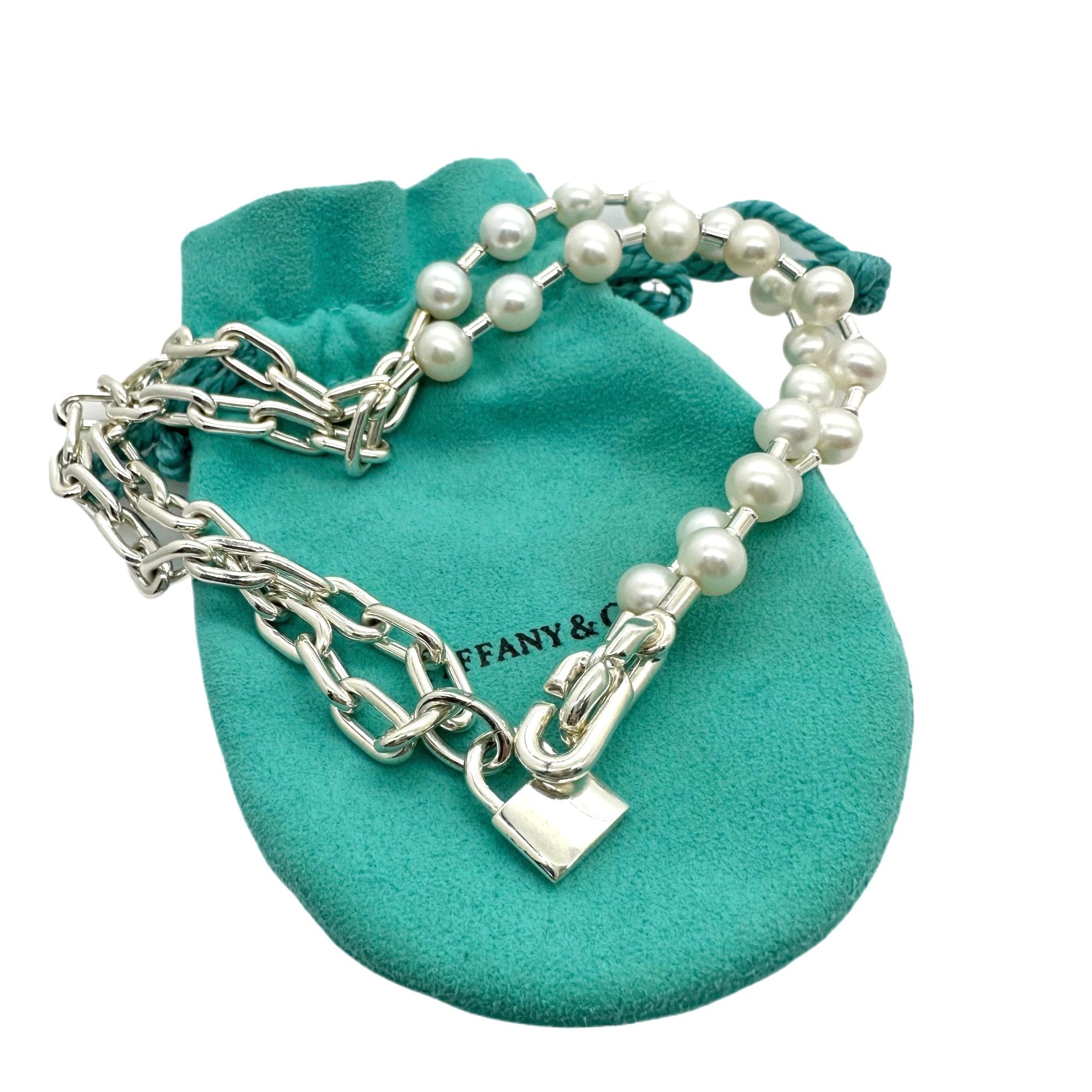 Tiffany & Co. HardWear Pearl Lock Bracelet
Style:   Wrap
Ref. No:  67063422
Metal:   Sterling Silver with Freshwater Pearls 7 - 8 MM
Size:   Medium - 11.5' Length
Hallmark:  Lock - TIFFANY & CO. NEW YORK / ©TIFFANY&CO. 925 ITALY
Includes:   Tiffany
