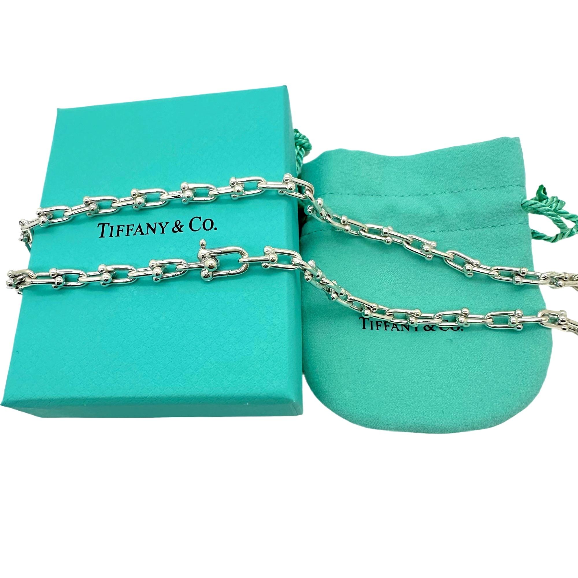 Tiffany & Co. Hardwear Small Link Necklace
Style:  Link
Ref. number:  60153093
Metal:  Sterling Silver
Size / Measurements:  18' Inches & 5 mm 
Hallmark:  ©&Co. Ag925 ITALY on closure
Includes:  T&C Jewelry Pouch & Outer Blue Box
EST. Retail:  $