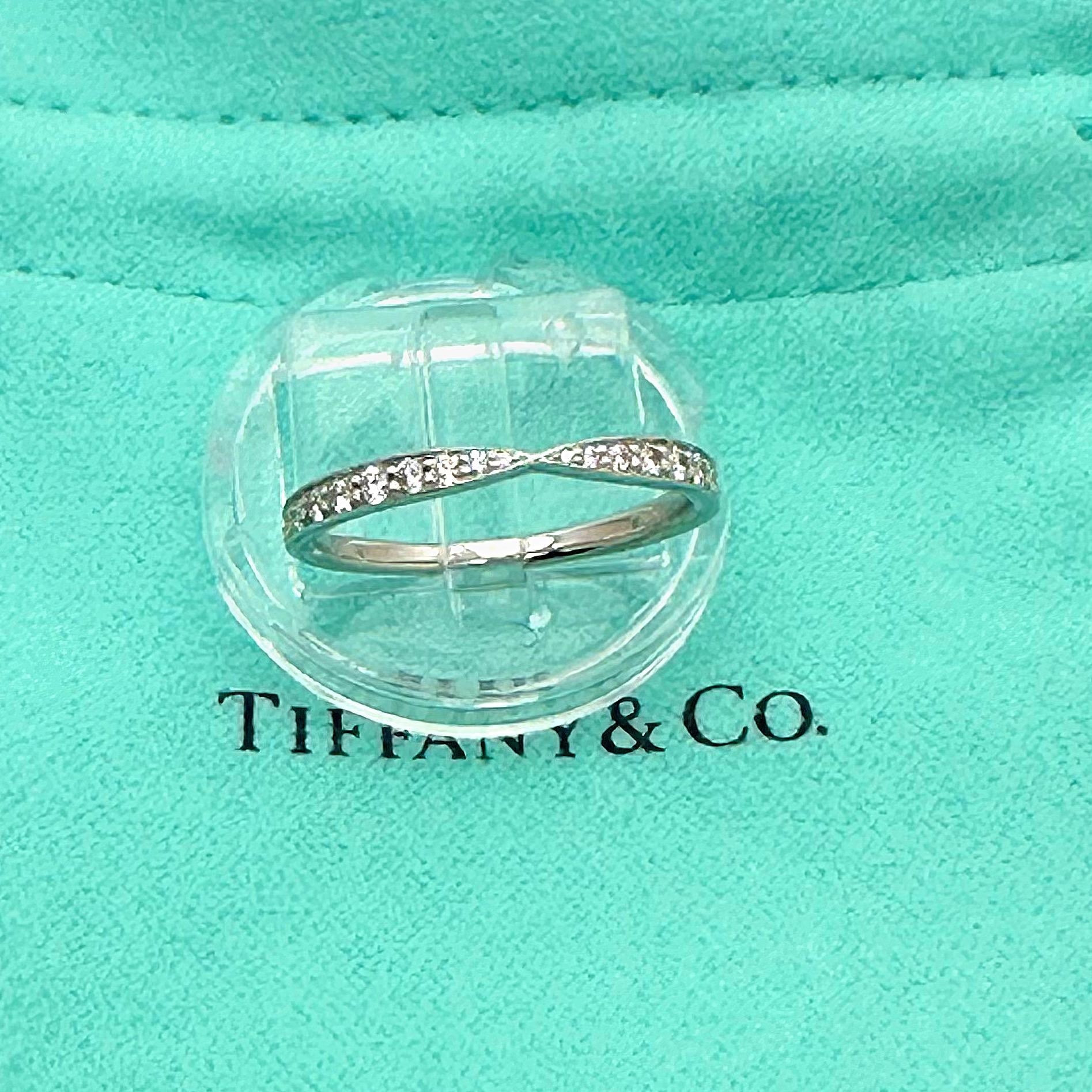 Tiffany & Co. HARMONY Diamond Band Ring
Style:  Band
Ref. number:  60004581
Metal:   Platinum PT950
Size:  6.75
Measurements:  1.8 MM 
Main Diamond:  22 Round Brilliant Diamond 0.23 tcw
Color & Clarity:  White & Clean
Hallmark:  ©TIFFANY&Co.