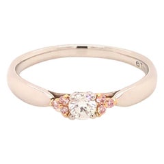 Tiffany & Co. Harmony Diamond, Fancy Pink Diamond Side Stone Platinum Ring