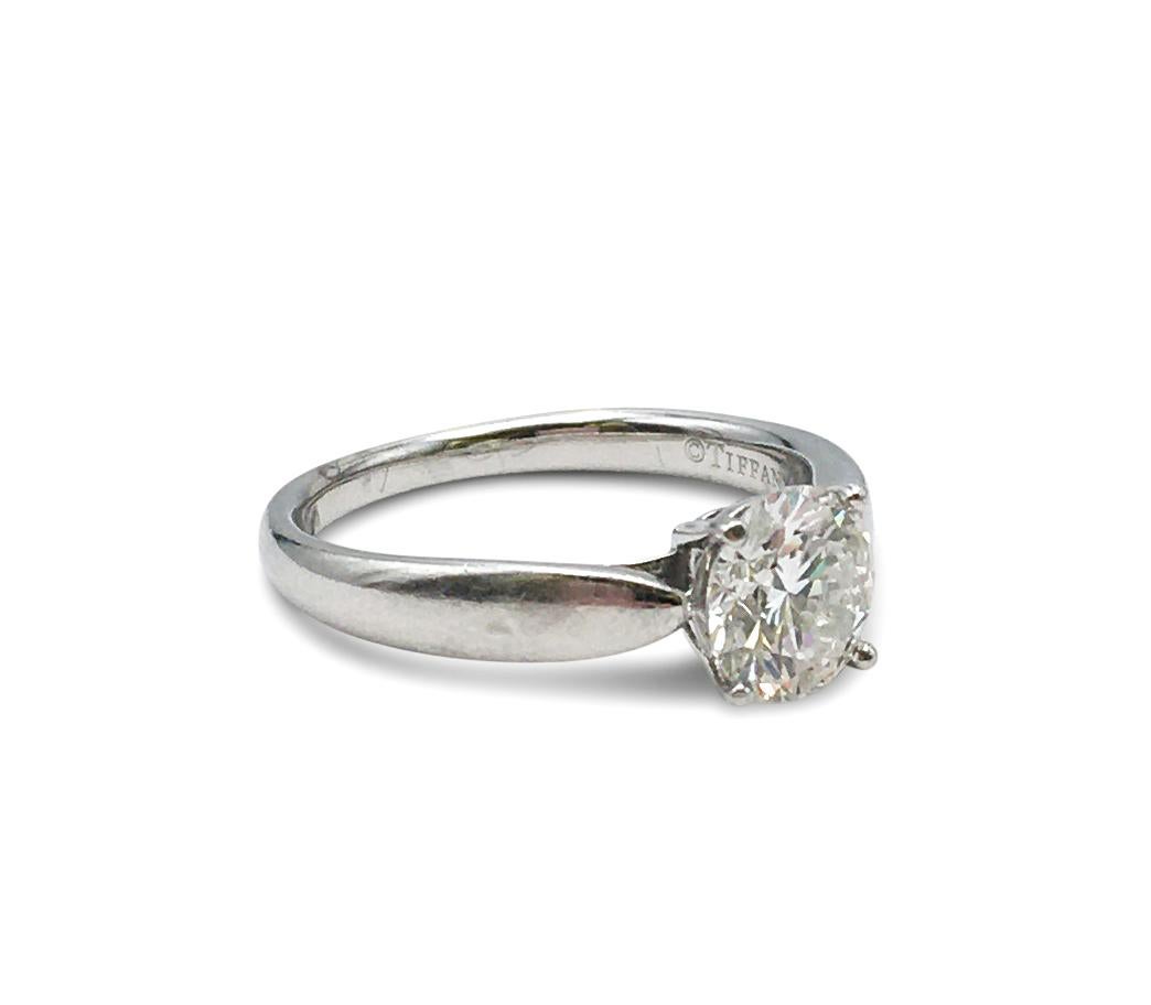 Authentic Tiffany & Co. platinum and diamond 'Harmony' solitaire ring.  This stunning ring is prong set with one round brilliant cut diamond weighing .95ct, H color, SI1 clarity.  Size  4 3/4.  Signed Tiffany & Co., PT950, D 0.95ct, with the diamond