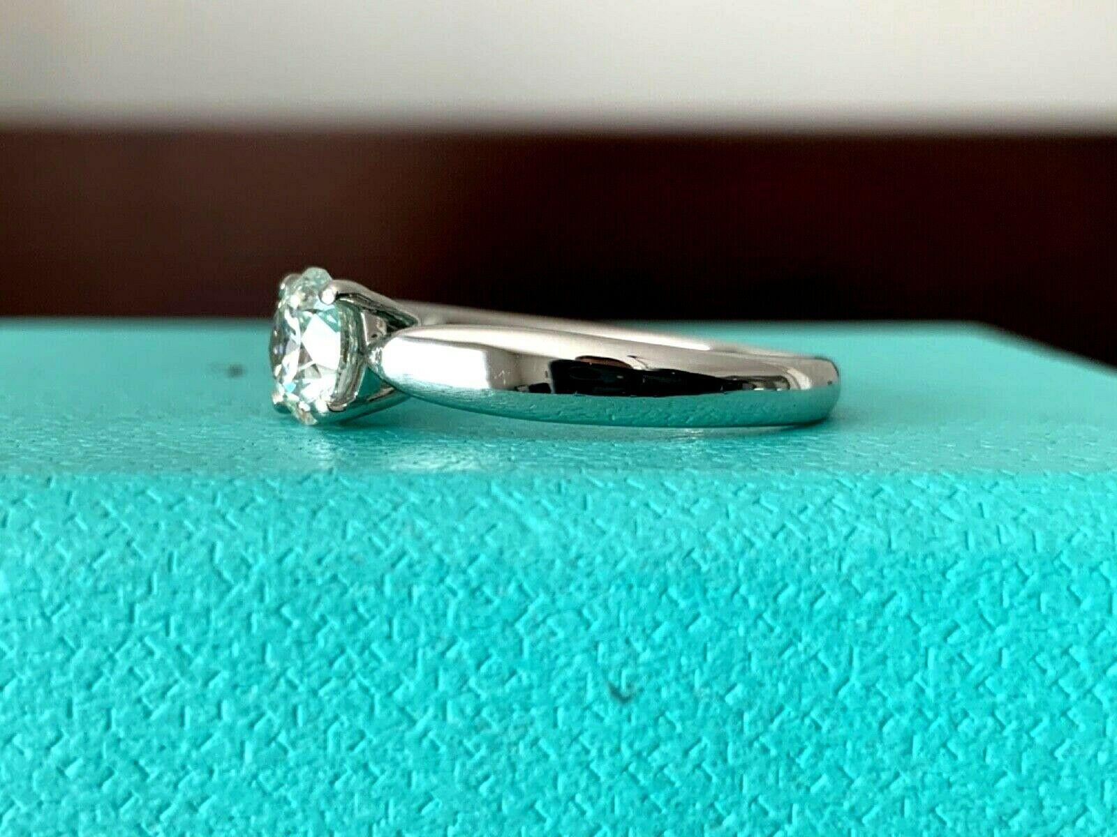 Round Cut Tiffany & Co. Harmony Platinum and Diamond Ring .59 Carat I Color VVS2 Clarity