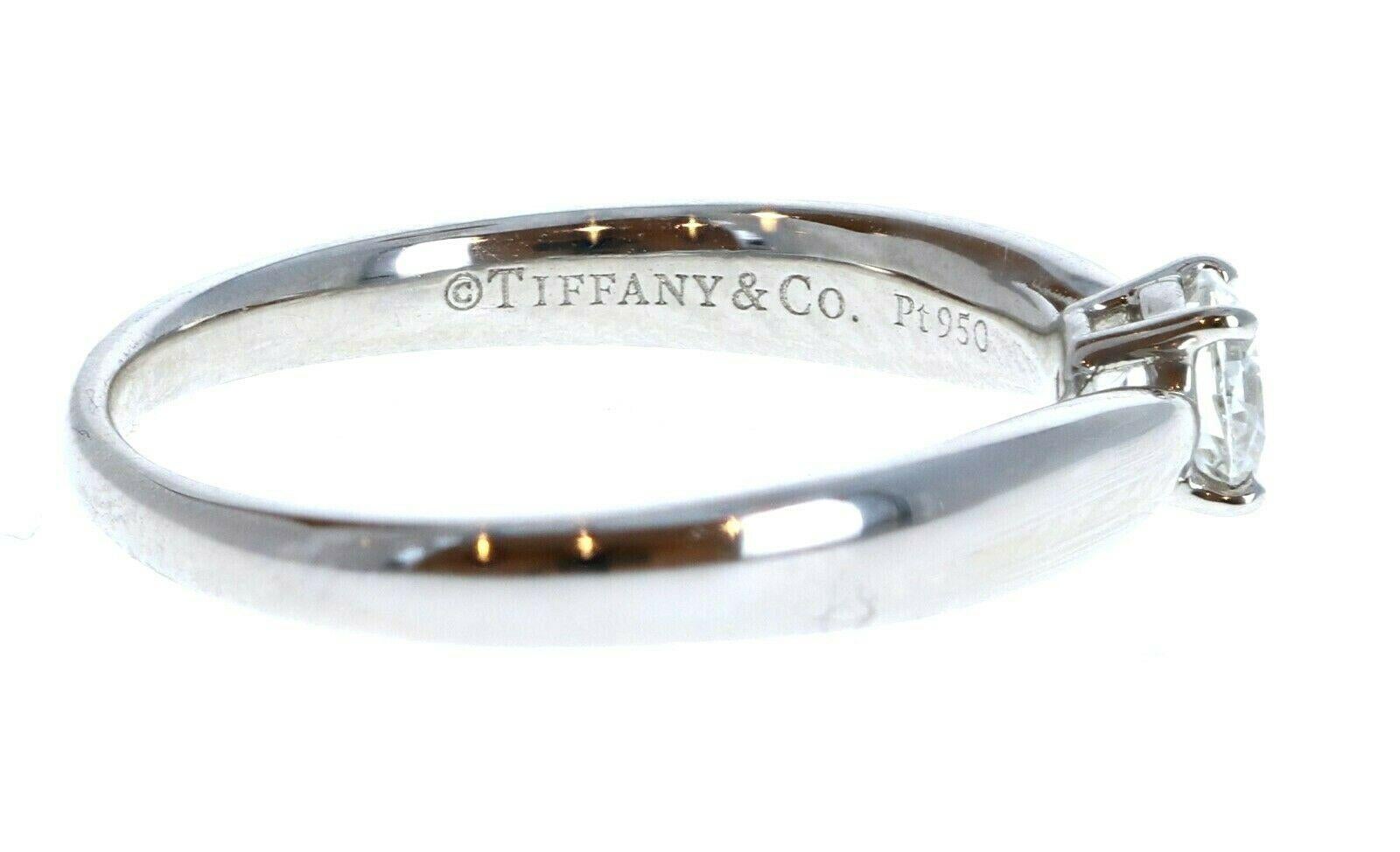 Tiffany & Co Harmony Platinum & Diamond Solitare Ring 0.24ctw 

For sale is a Tiffany & Co Harmony platinum and diamond solitaire engagement ring. 
The center stone is 0.24 ct. round brilliant cut diamond G-VS1
 Perfect worn day or night.
 Get this