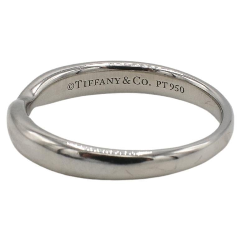 Tiffany & Co. Harmony Platinum Wedding Band Ring 3MM
Metal: Platinum
Weight: 3.72 grams
Width: 3mm
Size 4.5 (US)
Retail: $1,200 USD
