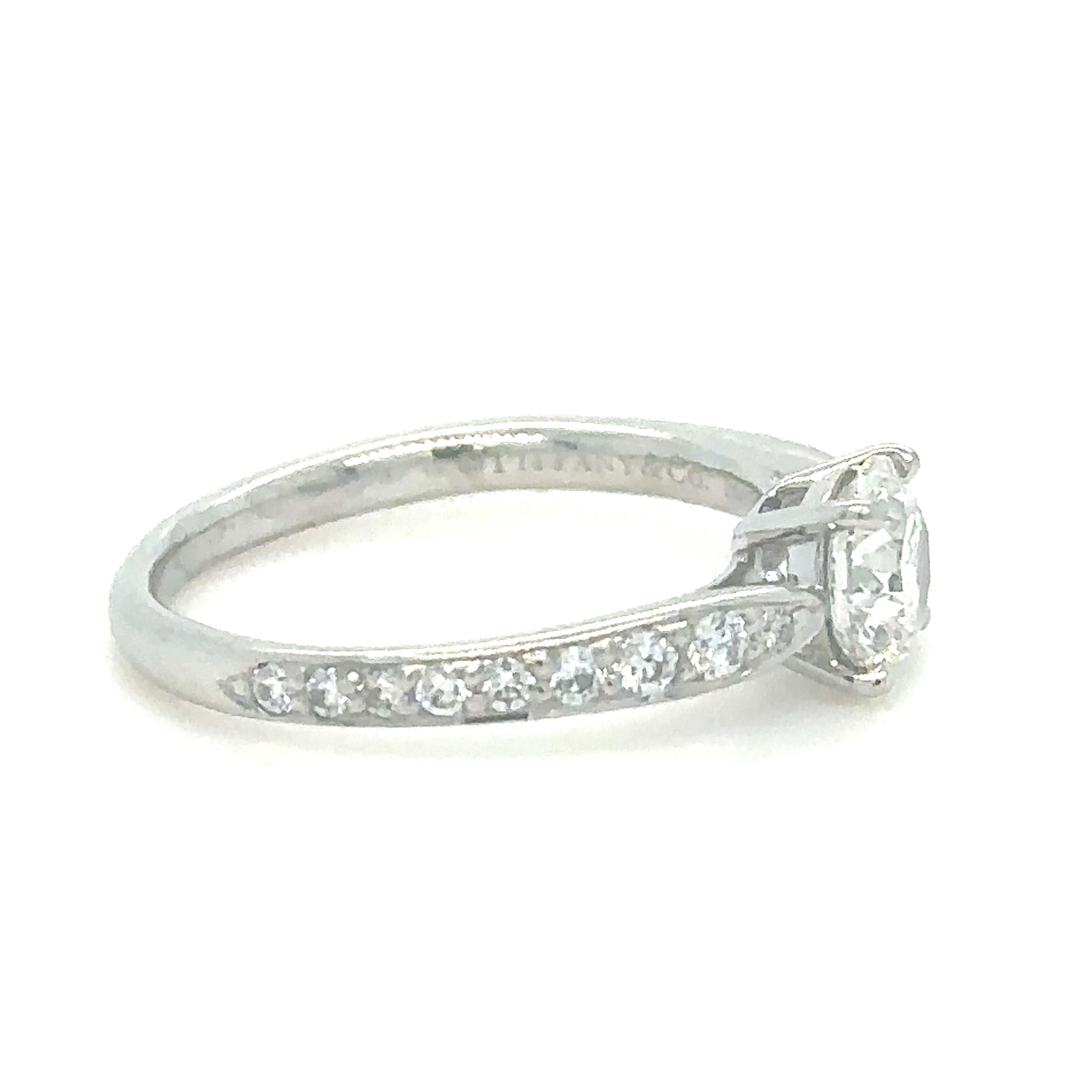 Unique features: 
Tiffany & Co Harmony Engagement Ring in Platinum 0.62ct

One Tiffany & Co platinum and diamond Tiffany Harmony Ring, set with one round brilliant cut diamond weighing .62ct, G colour, VVS1 clarity, bead set on the shank with round
