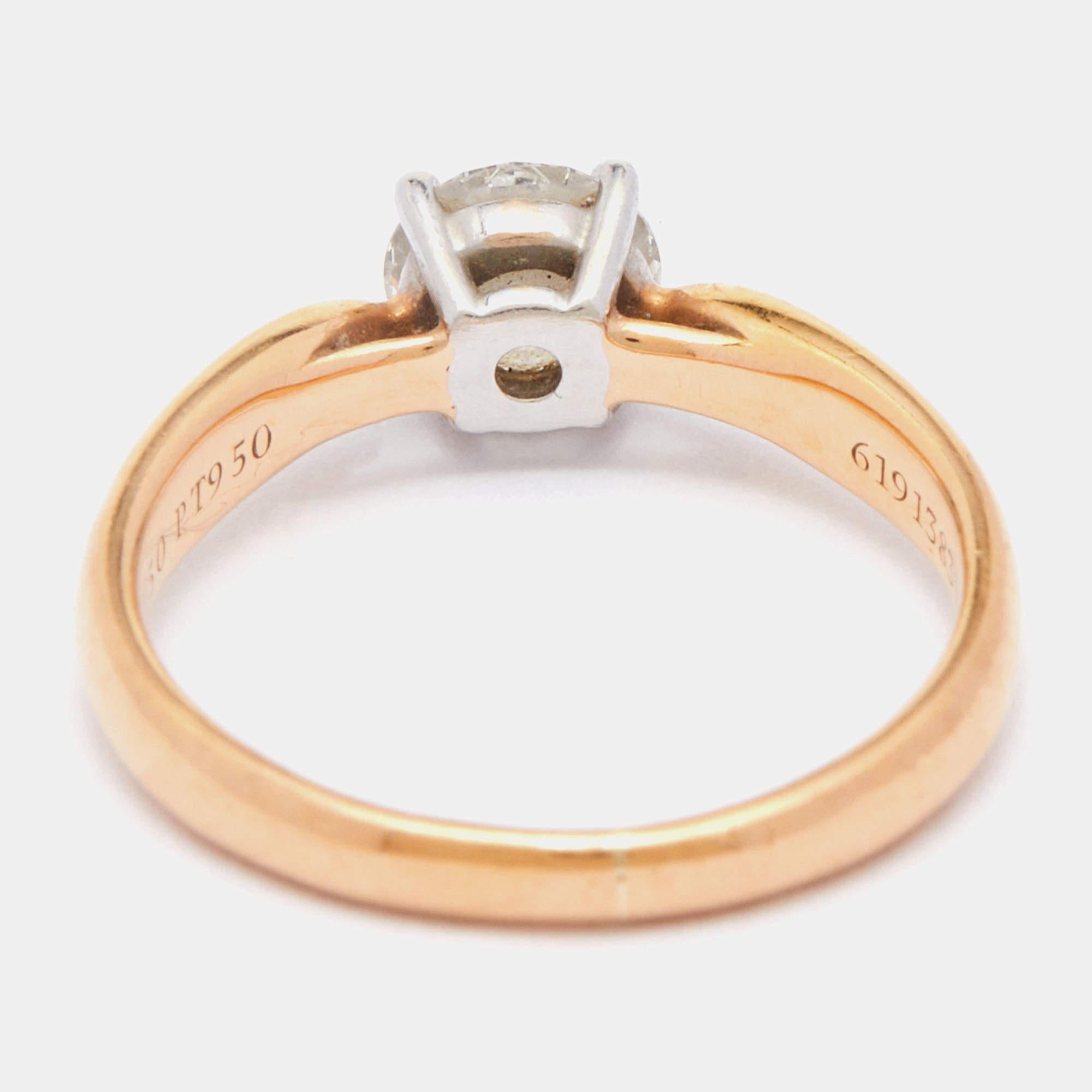 As is Tiffany's tradition to herald a diamond in a magnificent way, this Tiffany Harmony Solitaire ring comes in a romantic design, with a 0.50 ct G/VS2 diamond set on a four-prong setting. The band is in 18k rose gold, and the diamond is held by