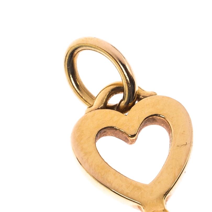 This Tiffany & Co. pendant is shaped like a key using 18k yellow gold and it has a heart-shaped bow. Like all of the other keys from Tiffany, this pendant also symbolizes a shining future.

Includes: Original Dustbag, Original Box

