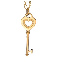 Tiffany & Co. Heart Key Pendant with Diamonds and Chain in 18 Karat Yellow Gold