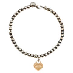 Tiffany & Co. Herz-Tag 18 Karat Roségold und Sterlingsilber Perlen-Charm-Armband