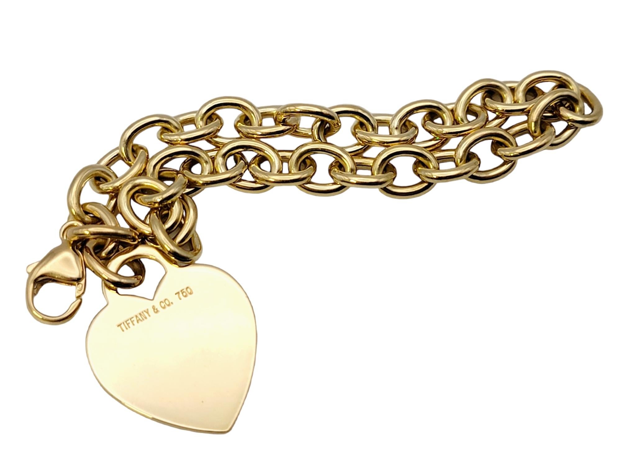 Tiffany & Co. Bracelet à maillons avec étiquette en forme de cœur en or jaune poli 18 carats Pour femmes en vente