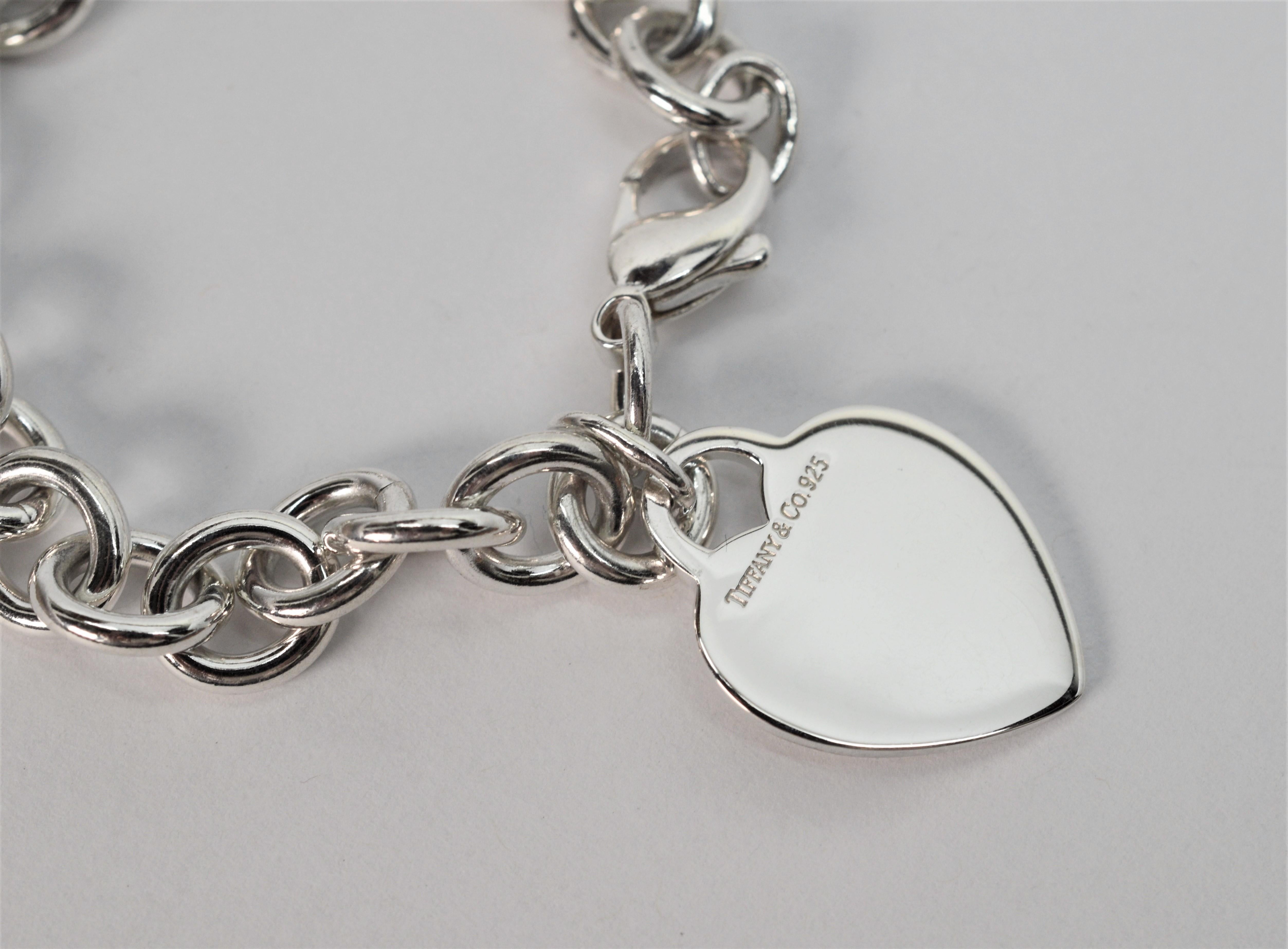 The heart tag charm collection was inspired by T & Co.'s key ring collection first introduced by in 1969. This wildly popular .925 sterling silver charm bracelet has generous chain links approximately 10.8 mm width and the length of the piece is 7.5
