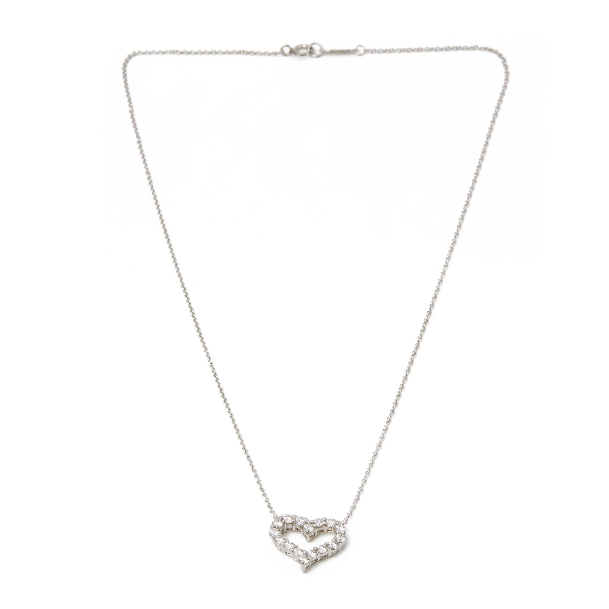 This pendant by Tiffany is from their Hearts collection and features 16 round brilliant cut diamonds set in a heart design and set in platinum with a 41cm platinum chain. Complete with Tiffany pouch, box and bag. Our Xupes reference is J516 should