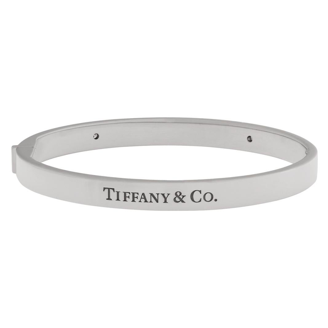 Tiffany & Co. Hinged Bangle Bracelet in 18k White Gold with 2 Diamonds In Excellent Condition In Surfside, FL