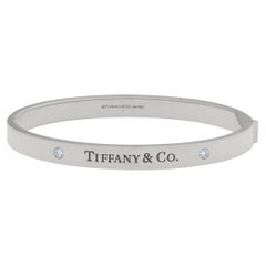 Tiffany & Co. Hinged Bangle Bracelet in 18k White Gold with 2 Diamonds
