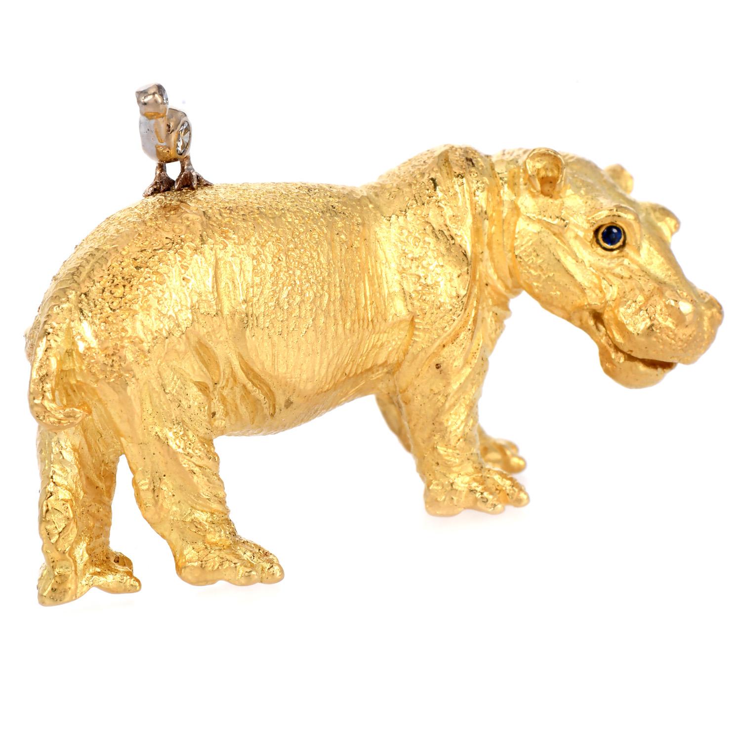 Estate Beautiful18k yellow gold pin brooch from 1989, Tiffany & Co. made and crafted in Germany

It features a hippopotamus made of high-contrast 18-karat yellow gold. An adorable bird is made with accent diamonds, perched on the hippopotamus's