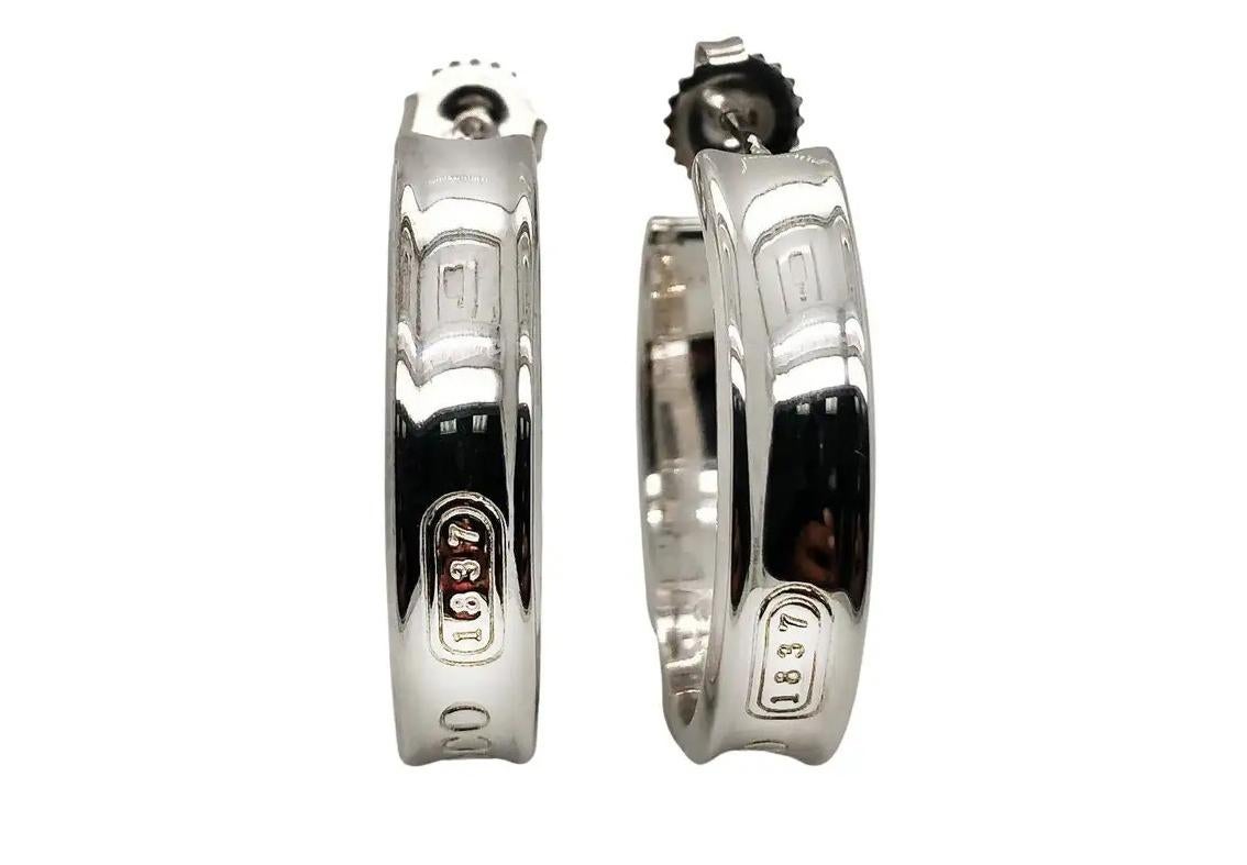 Tiffany & Co. Pendientes de aro T & Co. 1837  Caja y estuche de plata de ley