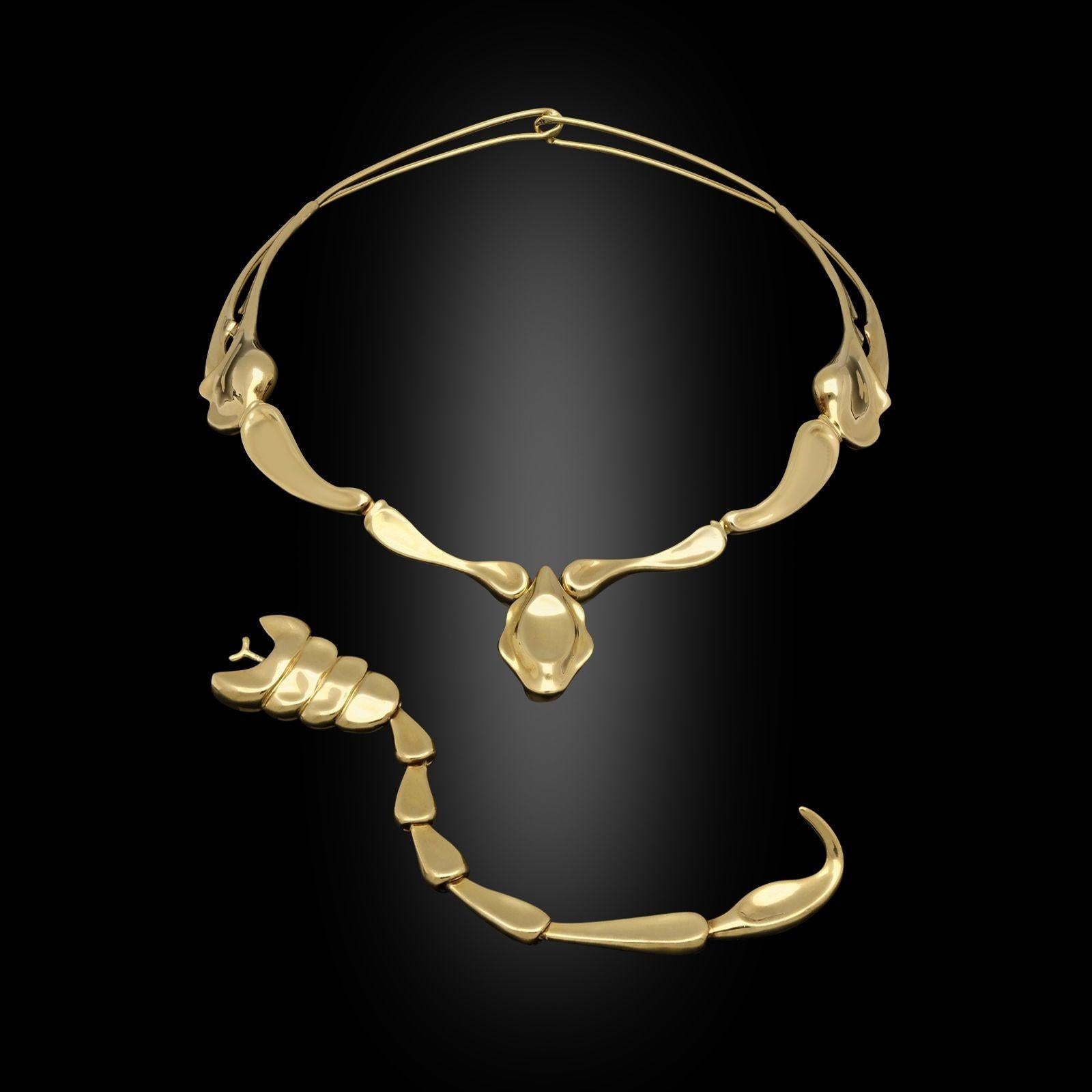An iconic 18ct yellow gold scorpion necklace by Tiffany & Co, designed by Elsa Peretti in 1979, the torque style necklace is formed by the elongated front legs and pincers of the scorpion made in articulated segments for comfort and fit, the