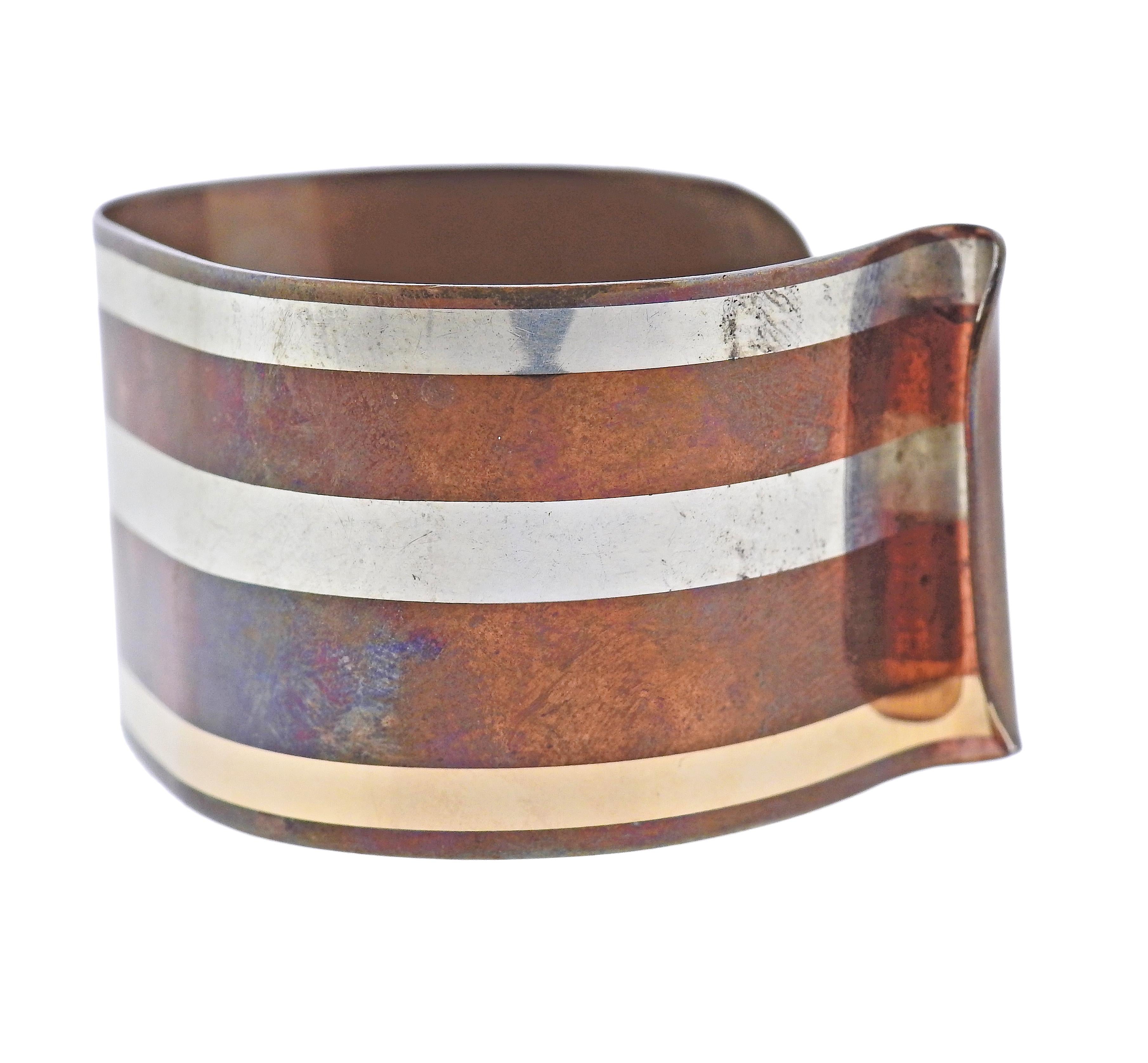 Iconic vintage Tiffany & Co mixed metal wide cuff, featuring copper, silver and gold. Bracelet will fit approx. 7-7.25