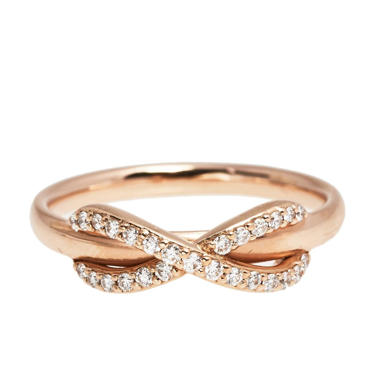 The Infinity collection by Tiffany & Co. stands to powerfully symbolize a continuous flow of connection, energy, and vitality. The brand smoothly blends the meaning of Infinity with timeless charm and infuses it into this ring. Made of 18k rose