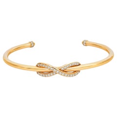 Tiffany & Co. Bracelet manchette Infinity en or jaune 18 carats, taille moyenne