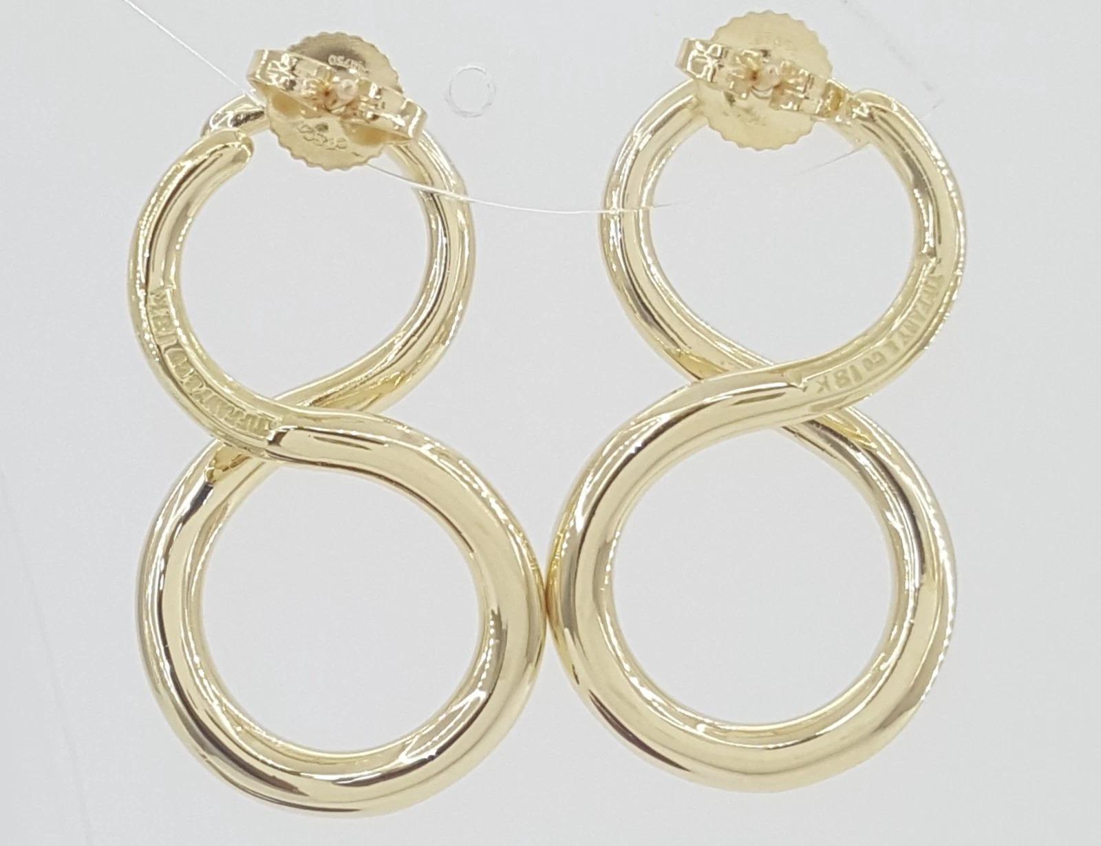 Tiffany & Co. Pendientes grandes Infinity de oro amarillo de 18 quilates Contemporáneo en venta