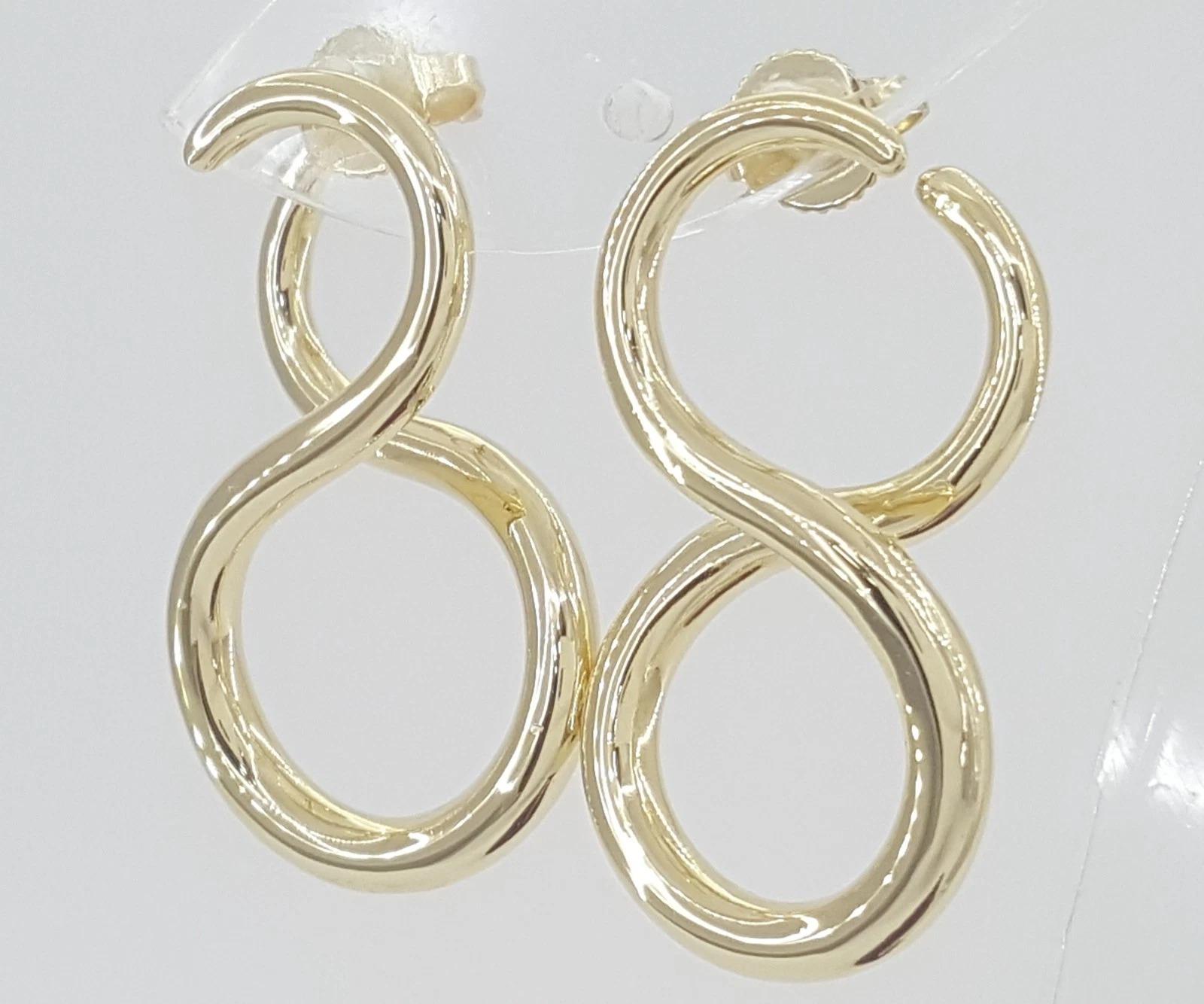 Tiffany & Co. Pendientes grandes Infinity de oro amarillo de 18 quilates en venta 2