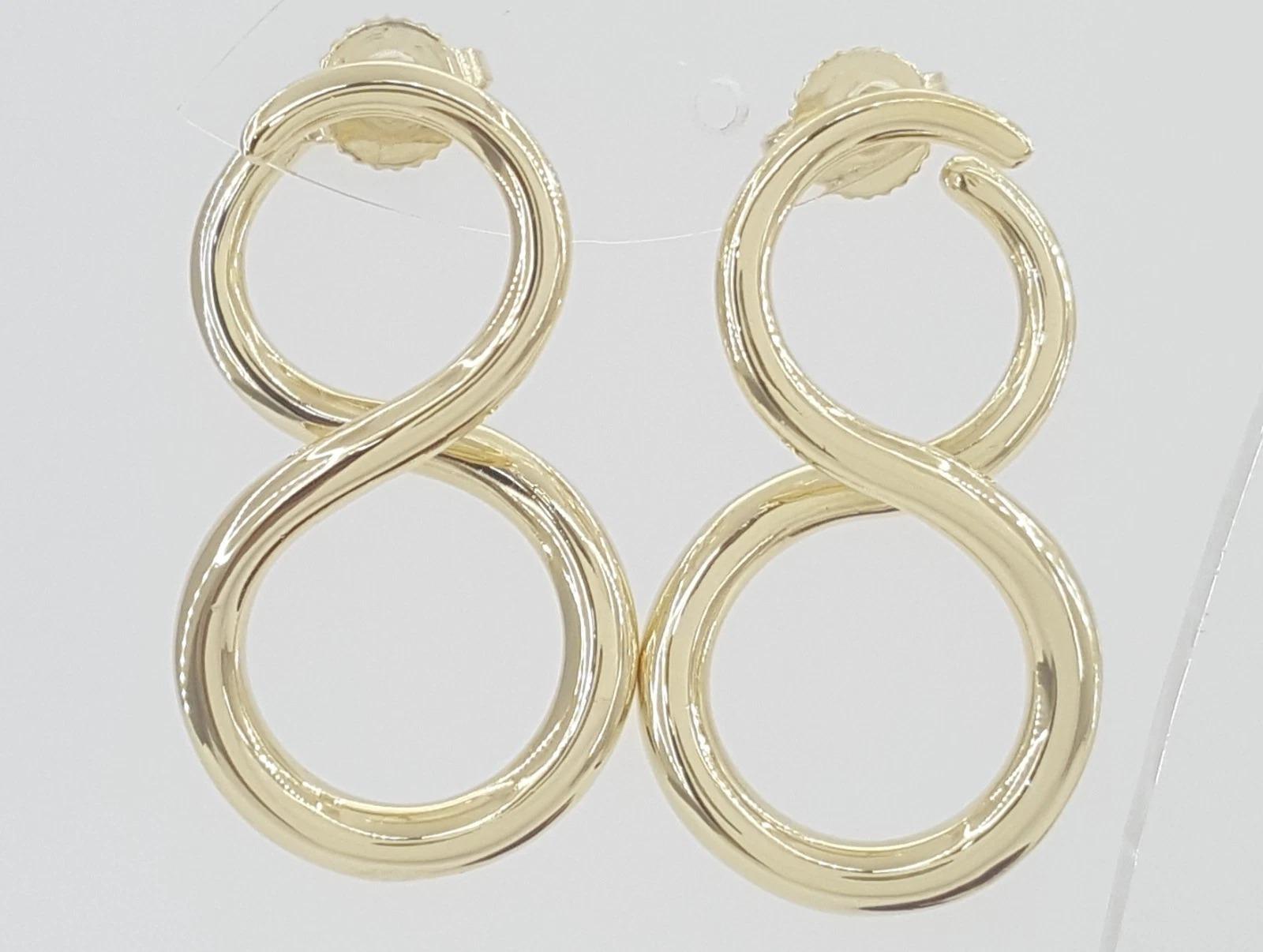 Tiffany & Co. Pendientes grandes Infinity de oro amarillo de 18 quilates en venta 3