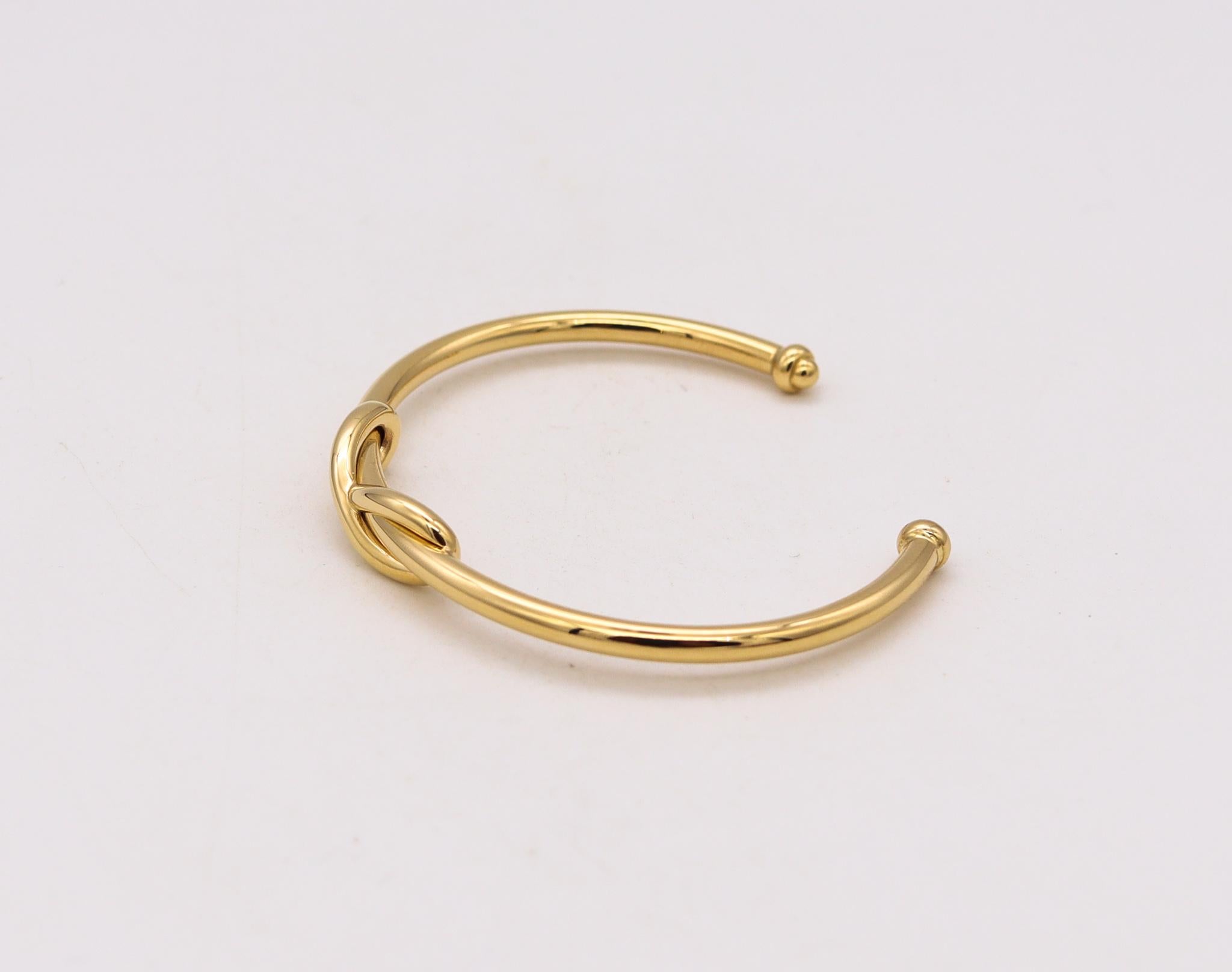 Tiffany Co Infinity Motif Cuff Bracelet In Solid 18Kt Yellow Gold With Boxes In Excellent Condition For Sale In Miami, FL