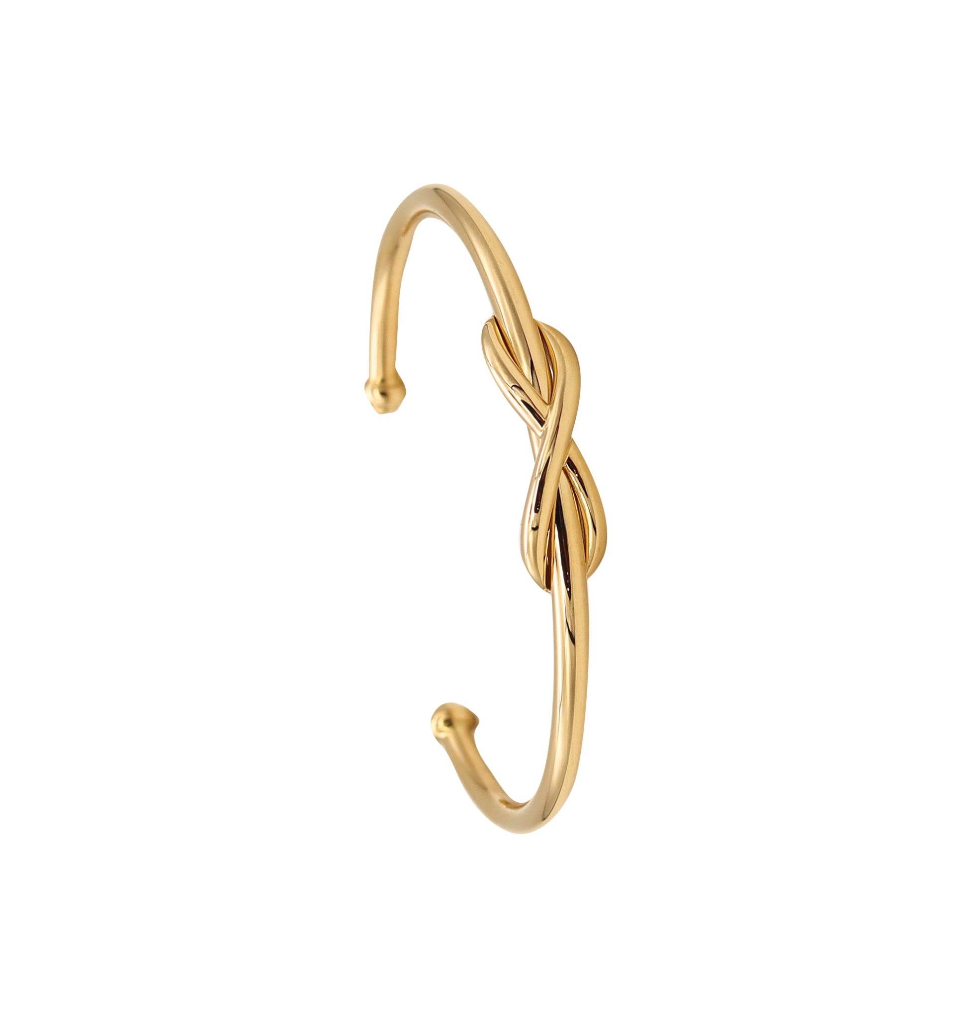 TIFFANY & CO. Manschettenarmband mit Unendlichkeitsmotiv aus massivem 18 Karat Gelbgold mit Schachteln 2