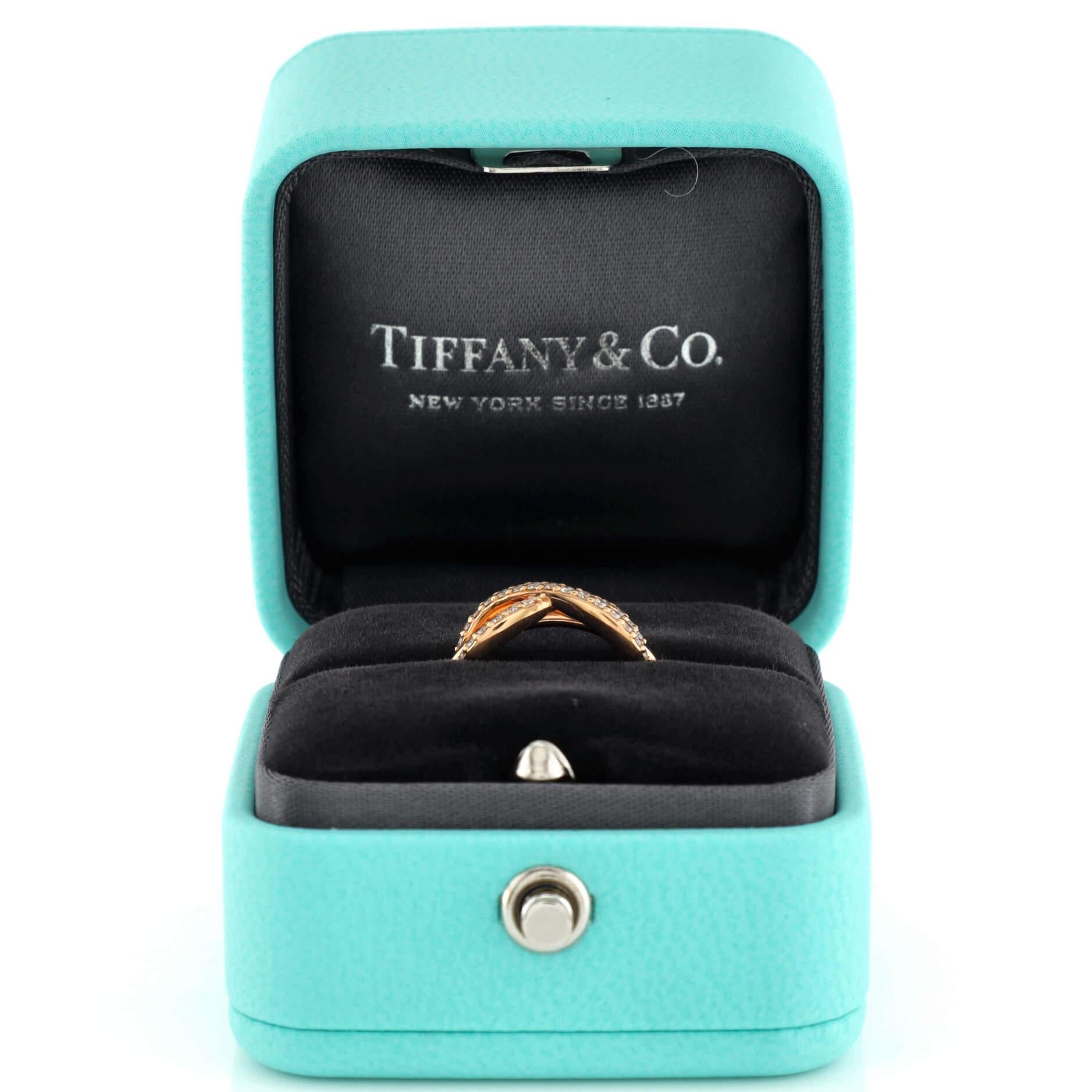 Condition: Excellent. Faint wear throughout.
Accessories: No Accessories
Measurements: Size: 3.75 - 46, Width: 2.45 mm
Designer: Tiffany & Co.
Model: Infinity Ring 18K Rose Gold and Diamonds
Exterior Color: Rose Gold
Item Number: 224822/1