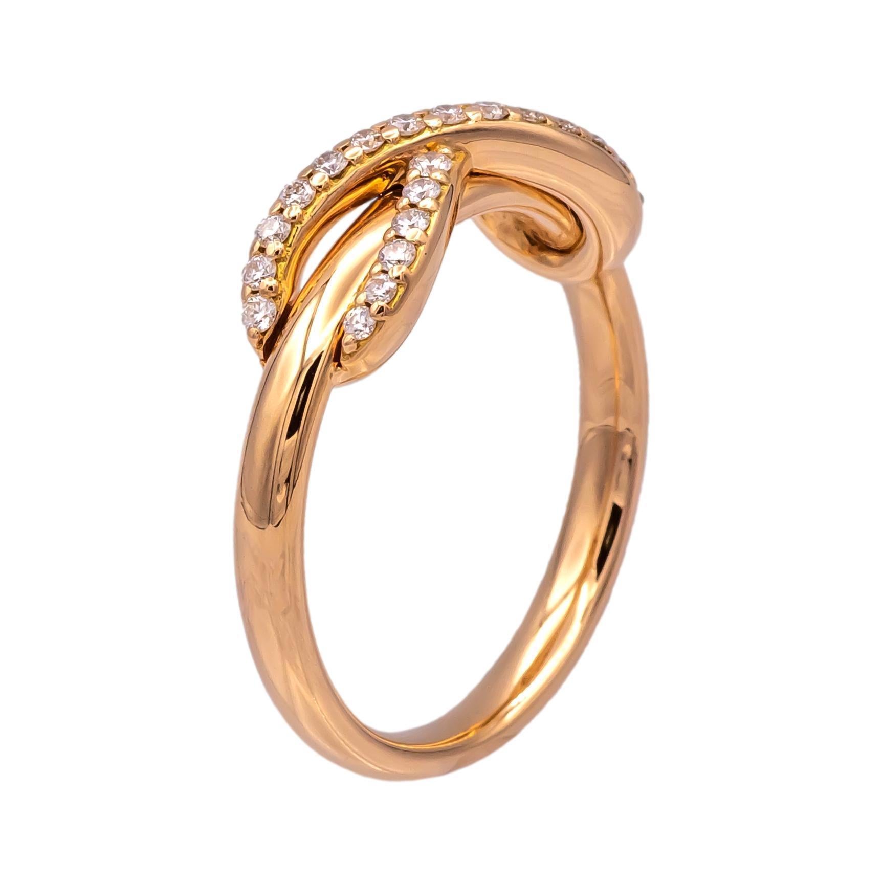 This Tiffany & Co. Infinity Ring, crafted in 18K rose gold, represents timeless elegance and symbolizes everlasting love. The ring features 27 round brilliant-cut diamonds totaling 0.27 carats, graded F-G color and VS/VVS clarity, gracefully set