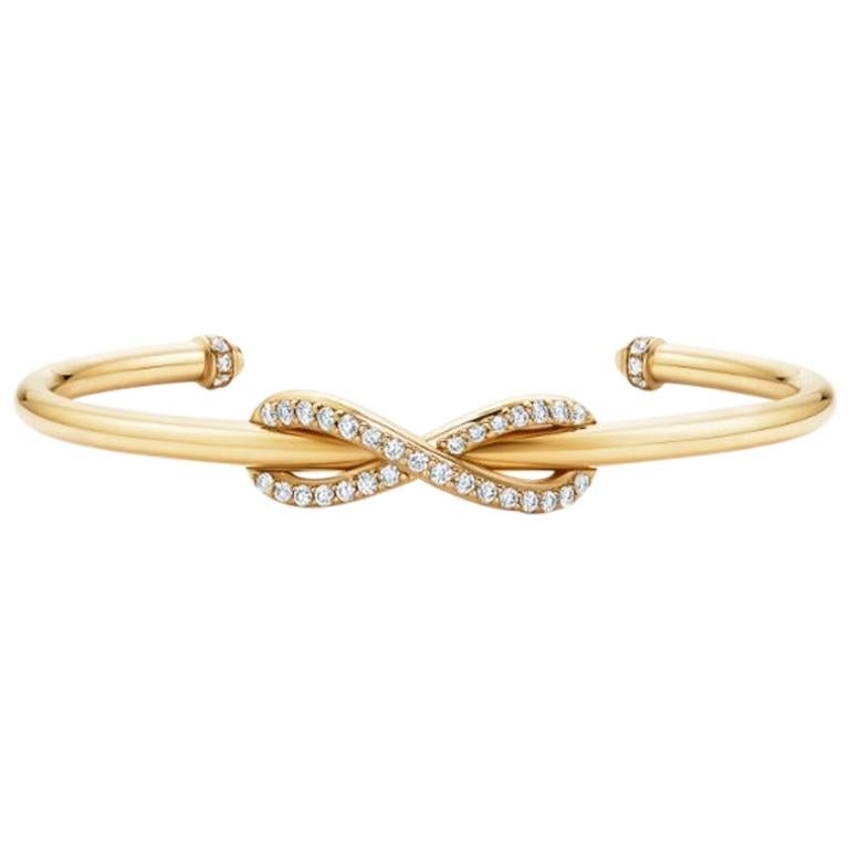 Tiffany and Co. Infinity Yellow Gold Diamond Cuff Medium Size For Sale at  1stDibs | tiffany infinity cuff, tiffany infinity bracelet, tiffany  infinity bangle