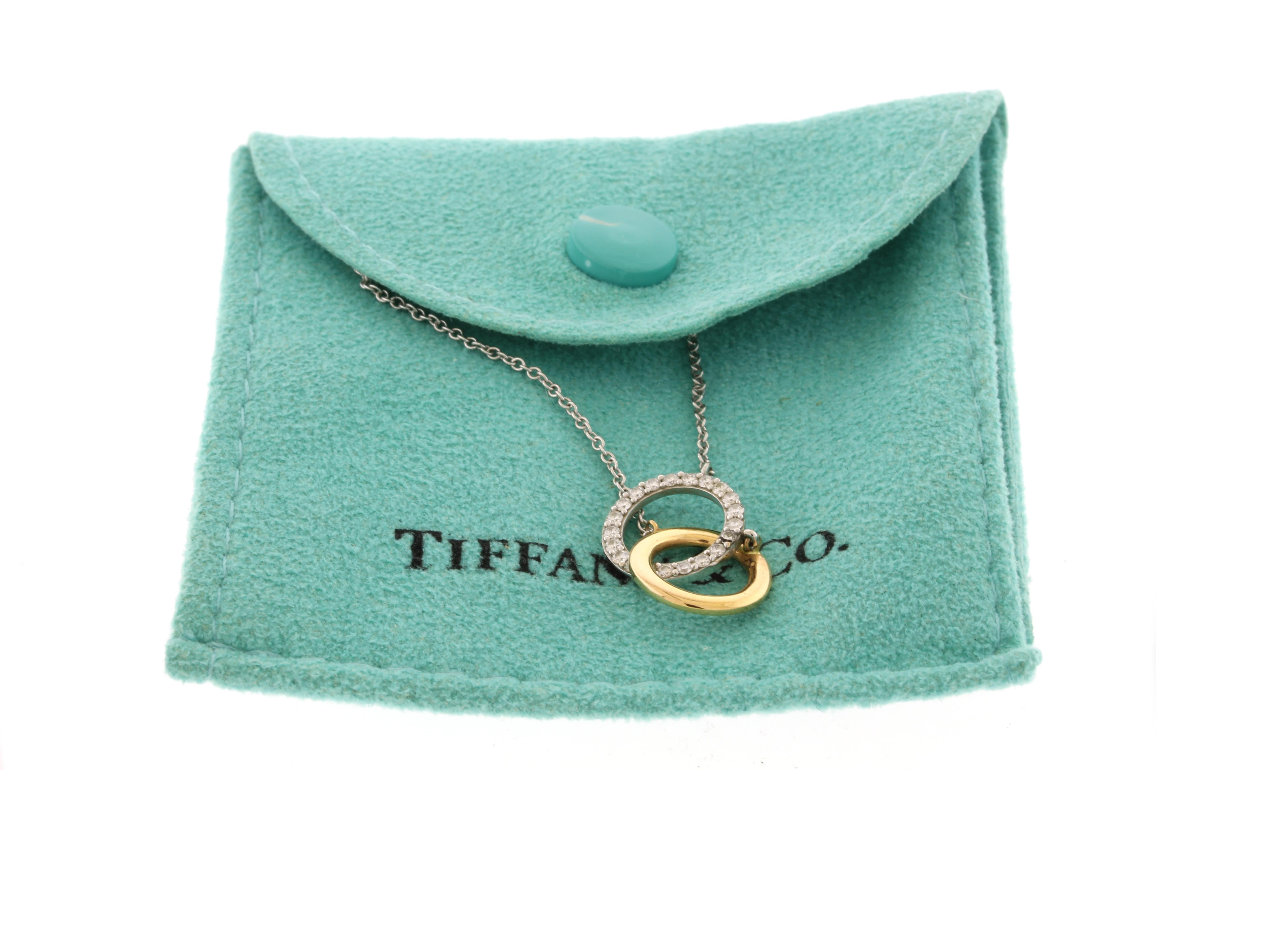 Experience elegance and luxury with the Tiffany & Co. Interlocking Rings Necklace. Made with 18kt white and rose gold and adorned with 21 diamonds totaling 0.17 carats, this necklace is the perfect addition to any outfit. With a length of 16 inches,
