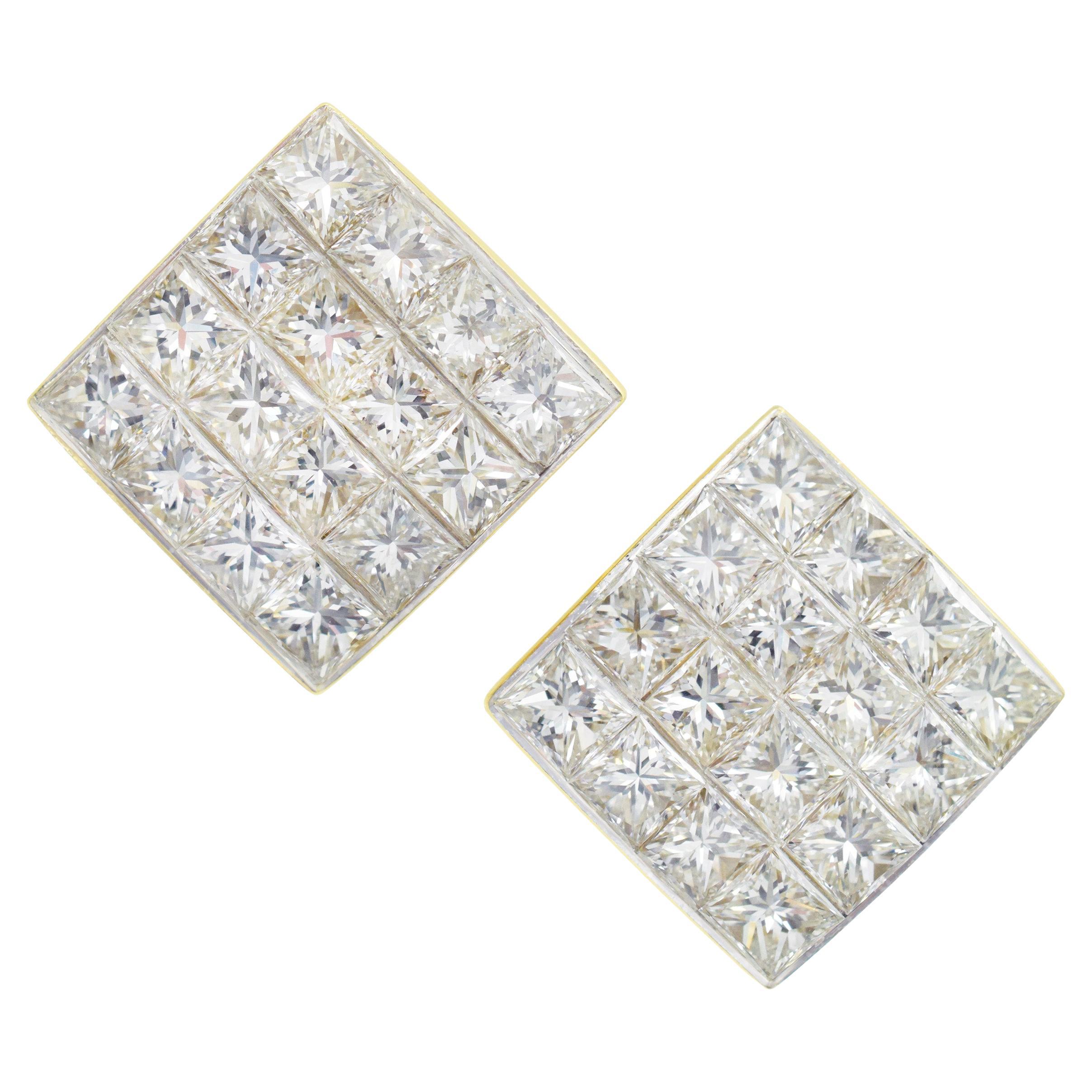 Tiffany & Co. Invisible set diamond earrings in 18k yellow gold. The earrings feature
square design, invisibly set with 32 princess cut diamonds with total weight of approximately 6.5ct, color F-G, clarity VSSI. Crafted in 18k yellow gold. Equipped