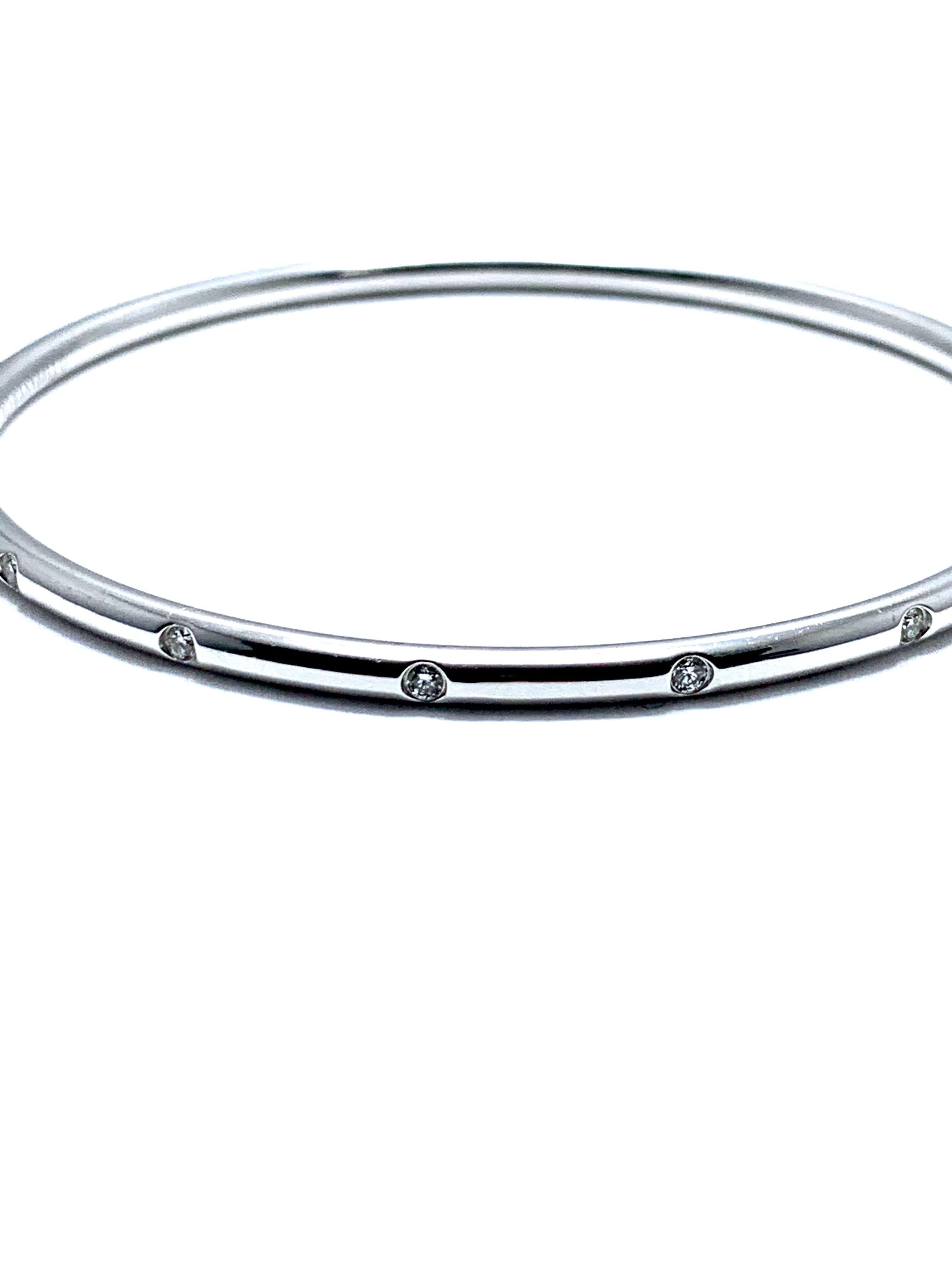 Simple and modern, the designed of the Etoile collection are elegantly punctuated with round brilliant Diamonds.  This beautiful bangle is a timeless touch to any wardrobe.  There are a total of 16 round brilliant Diamonds with a total weight of