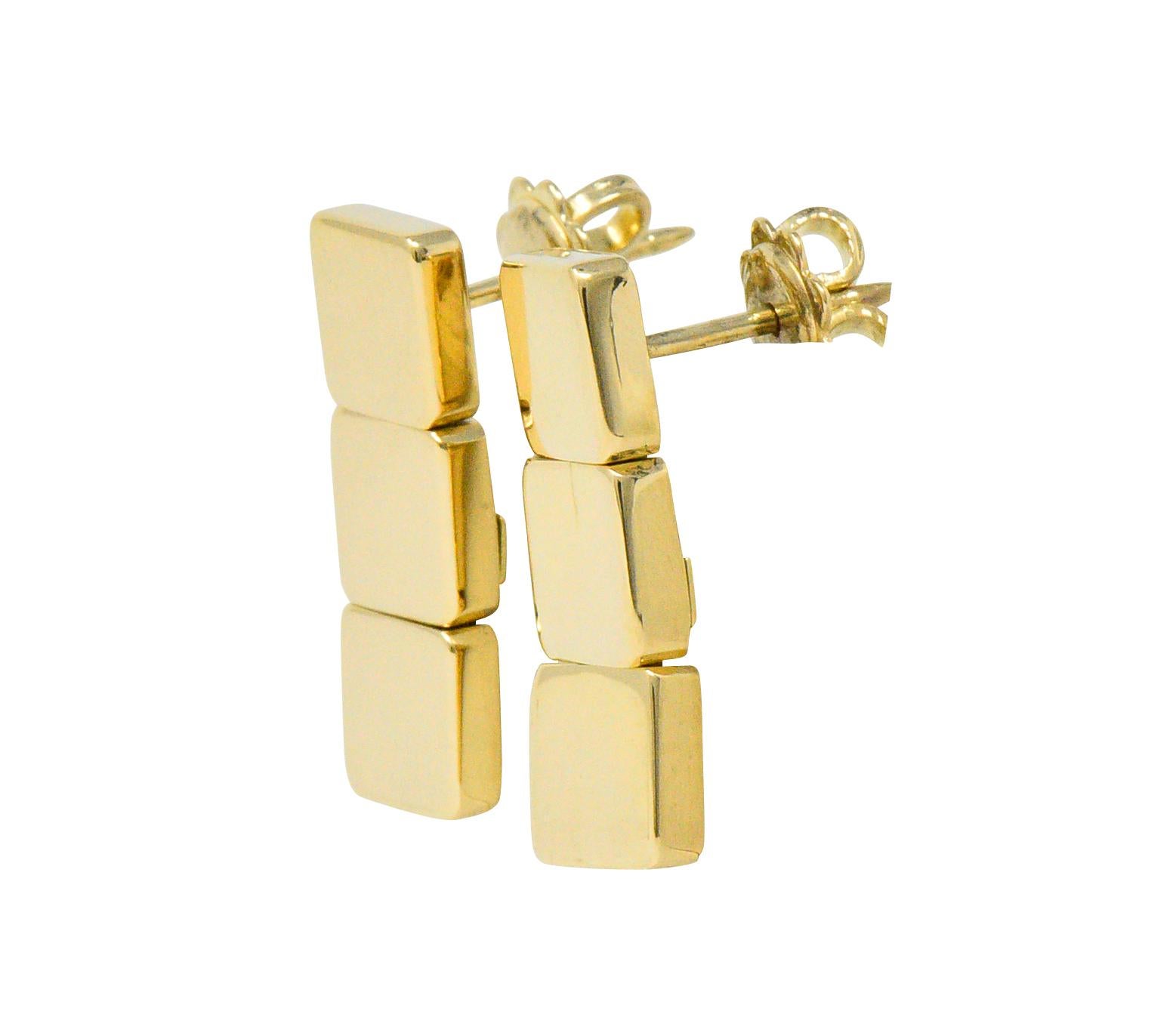 Featuring 3 highly polished square gold links

Post and friction backs

Signed T & Co., Italy, 2002

Measuring: Approx. 20.9 mm x 6.8 mm

Total Weight: 8.0 Grams

Sleek. Contemporary. Simple. 
 


Stock Number: We- 1555