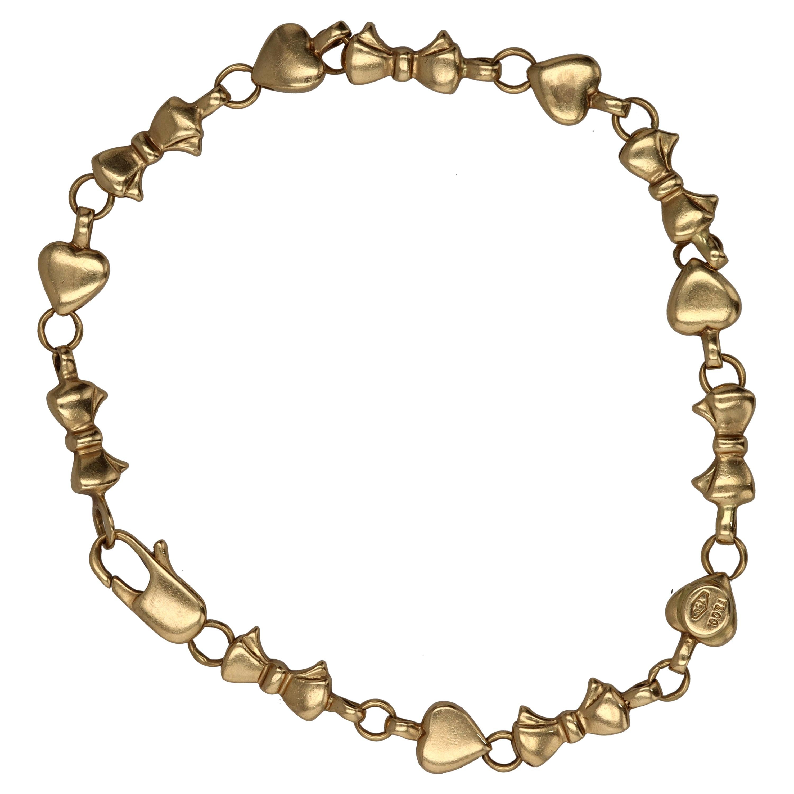 Tiffany & Co. Italy 18 Karat Heart and Bowtie Motif Link Bracelet For Sale
