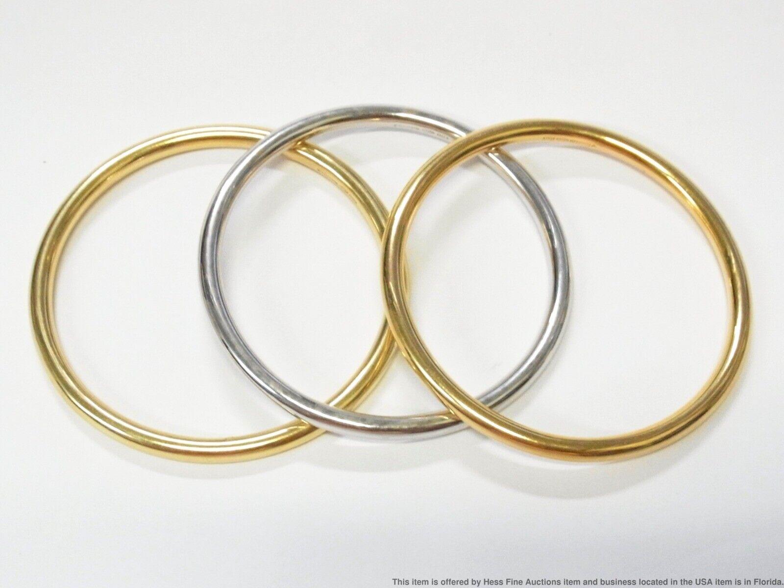 Tiffany & Co. Italy 18k Yellow & White Gold Trio of Bangle Bracelets Vintage In Excellent Condition In Beverly Hills, CA