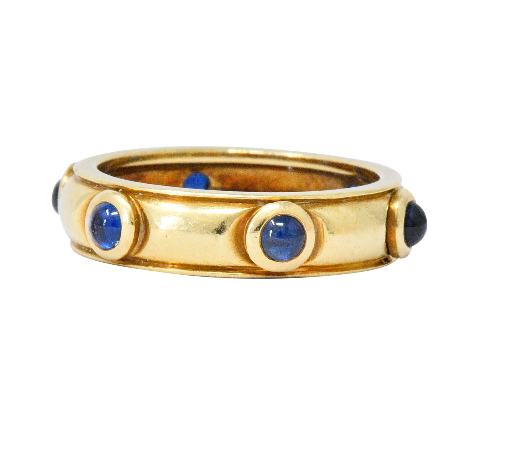 Featuring six round cabochon sapphires, weighing approximately 1.50 carats total, deep royal blue and very well matched

All sapphires are bezel set with domed polished gold between as well as edging detail

Fully signed Tiffany & Co., stamped Italy
